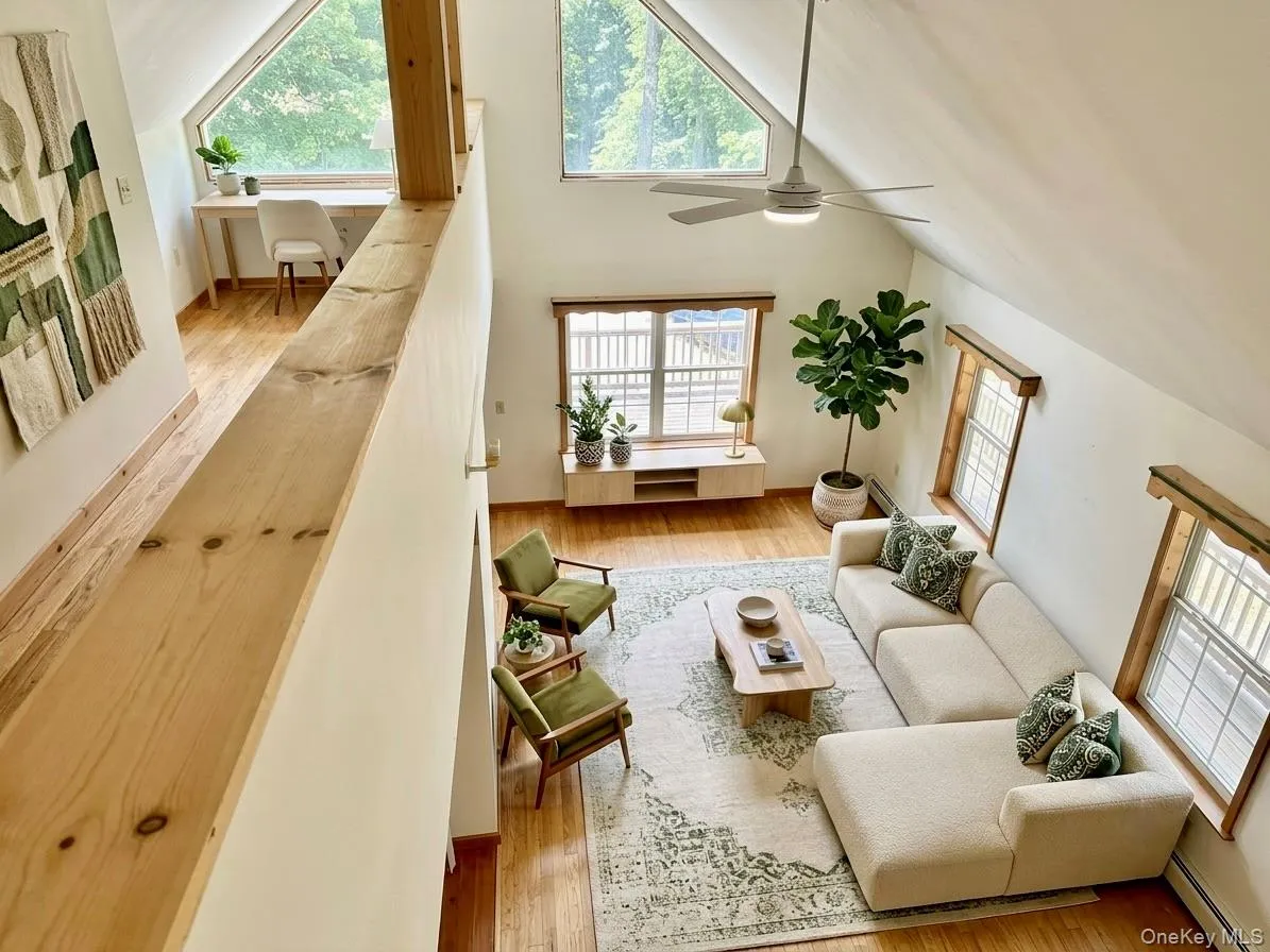 Virtually staged Living area and loft for design potential. Virtually staged Living area and loft for design potential.