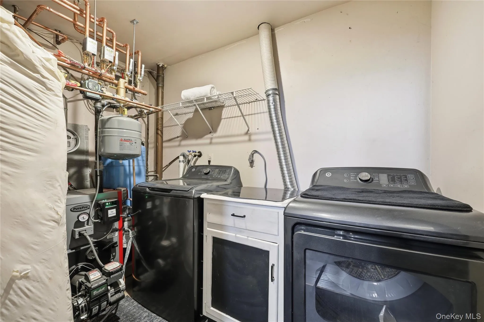 Laundry/utility room with brand new boiler Laundry/utility room with brand new boiler