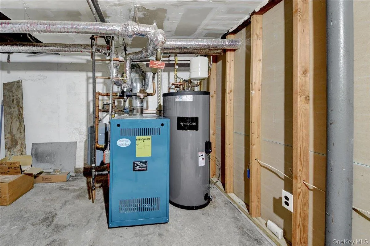 Basement - Boiler and Hot Water Tank Basement - Boiler and Hot Water Tank