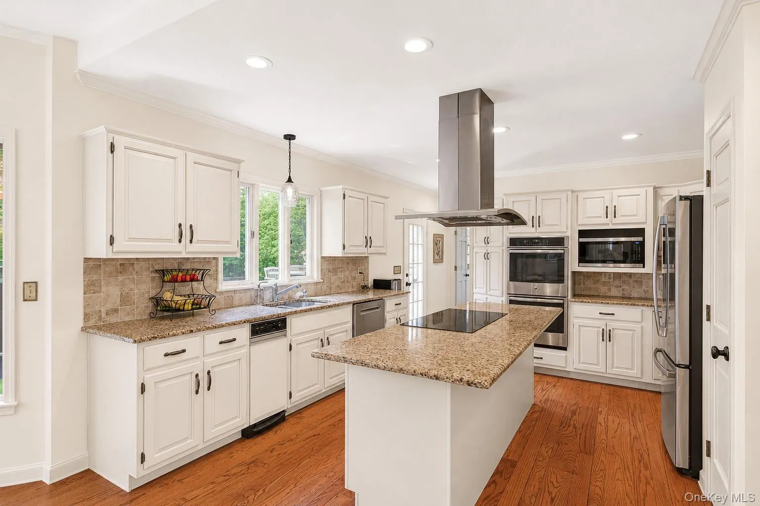 Virtually staged - shows walls, cabinets, trim painted white. Virtually staged - shows walls, cabinets, trim painted white.