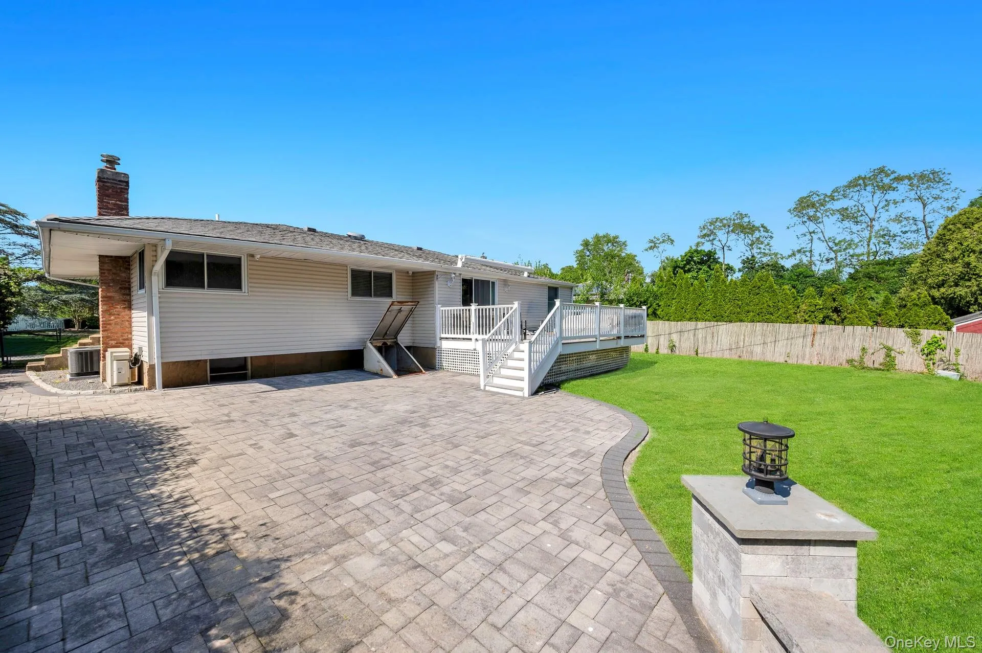 Back of House- Beautiful Deck and Patio! Perfect for Entertaining. Back of House- Beautiful Deck and Patio! Perfect for Entertaining.