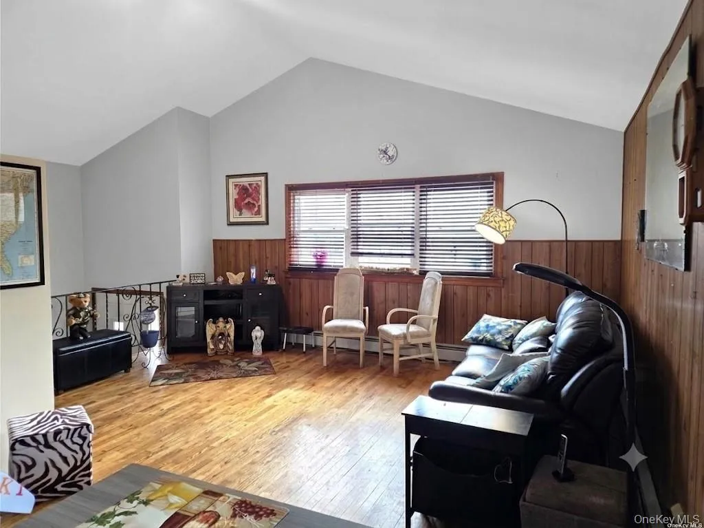 Another View Of The Light & Bright, Welcoming Living Room Offering Beautiful Hardwood Floors, Vaulted/Cathedral Ceilings, Ceiling Fan, Triple Window For Natural Light & Ample Room For A Good Sized Living Room Set/Furniture. Another View Of The Light & Bright, Welcoming Living Room Offering Beautiful Hardwood Floors, Vaulted/Cathedral Ceilings, Ceiling Fan, Triple Window For Natural Light & Ample Room For A Good Sized Living Room Set/Furniture.