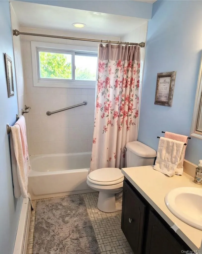 The Lovely Upstairs Bathroom Is Very Well Sized Offering A Large Vanity, Ceramic Tiled Floors, New Full Bathtub & All New Ceramic Tiled Walls/Tub Surround, Upgraded Fixtures & A Window For Natural Light. The Lovely Upstairs Bathroom Is Very Well Sized Offering A Large Vanity, Ceramic Tiled Floors, New Full Bathtub & All New Ceramic Tiled Walls/Tub Surround, Upgraded Fixtures & A Window For Natural Light.