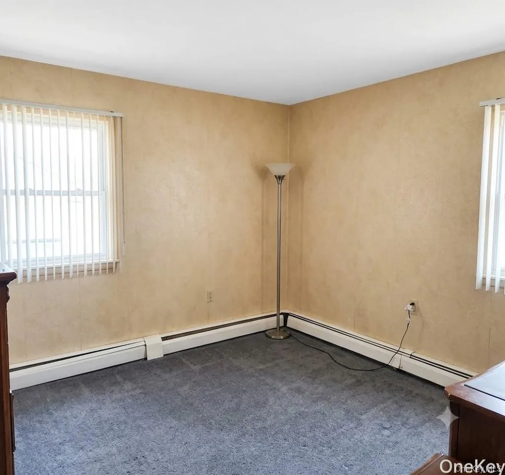 The Fourth Bedroom (Lower Level) Offers Two Large Windows For Natural Light, Closet & Ample Room For Furniture. The Fourth Bedroom (Lower Level) Offers Two Large Windows For Natural Light, Closet & Ample Room For Furniture.