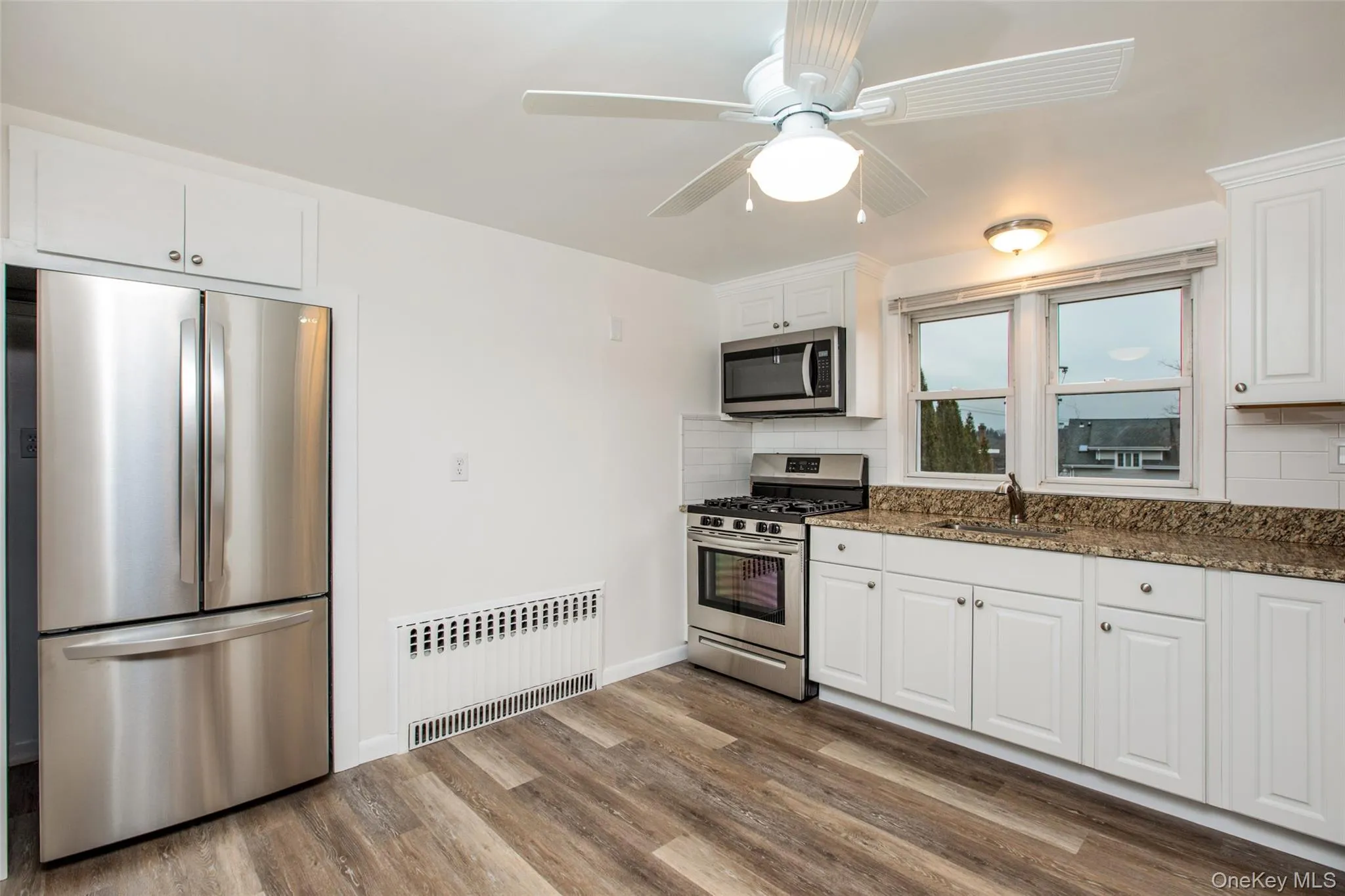 Stainless Steal Appliances **There is now a wall Air conditioning unit located at the middle/top of solid wall in this photo. It is not shown in this photo as photo was taken before it was installed. Stainless Steal Appliances **There is now a wall Air conditioning unit located at the middle/top of solid wall in this photo. It is not shown in this photo as photo was taken before it was installed.