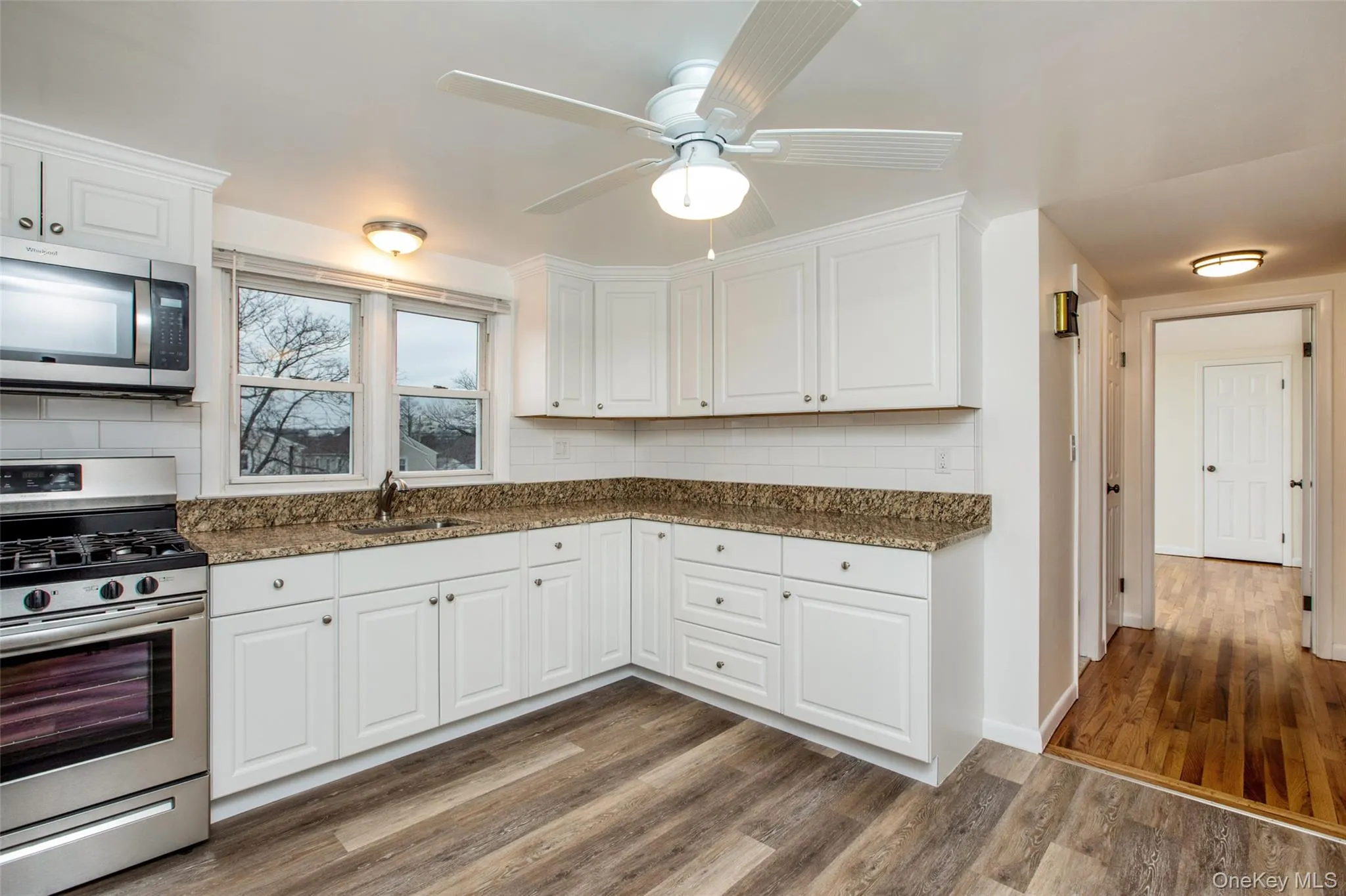 Another Kitchen angle showing hallway to 2nd bedroom. Another Kitchen angle showing hallway to 2nd bedroom.
