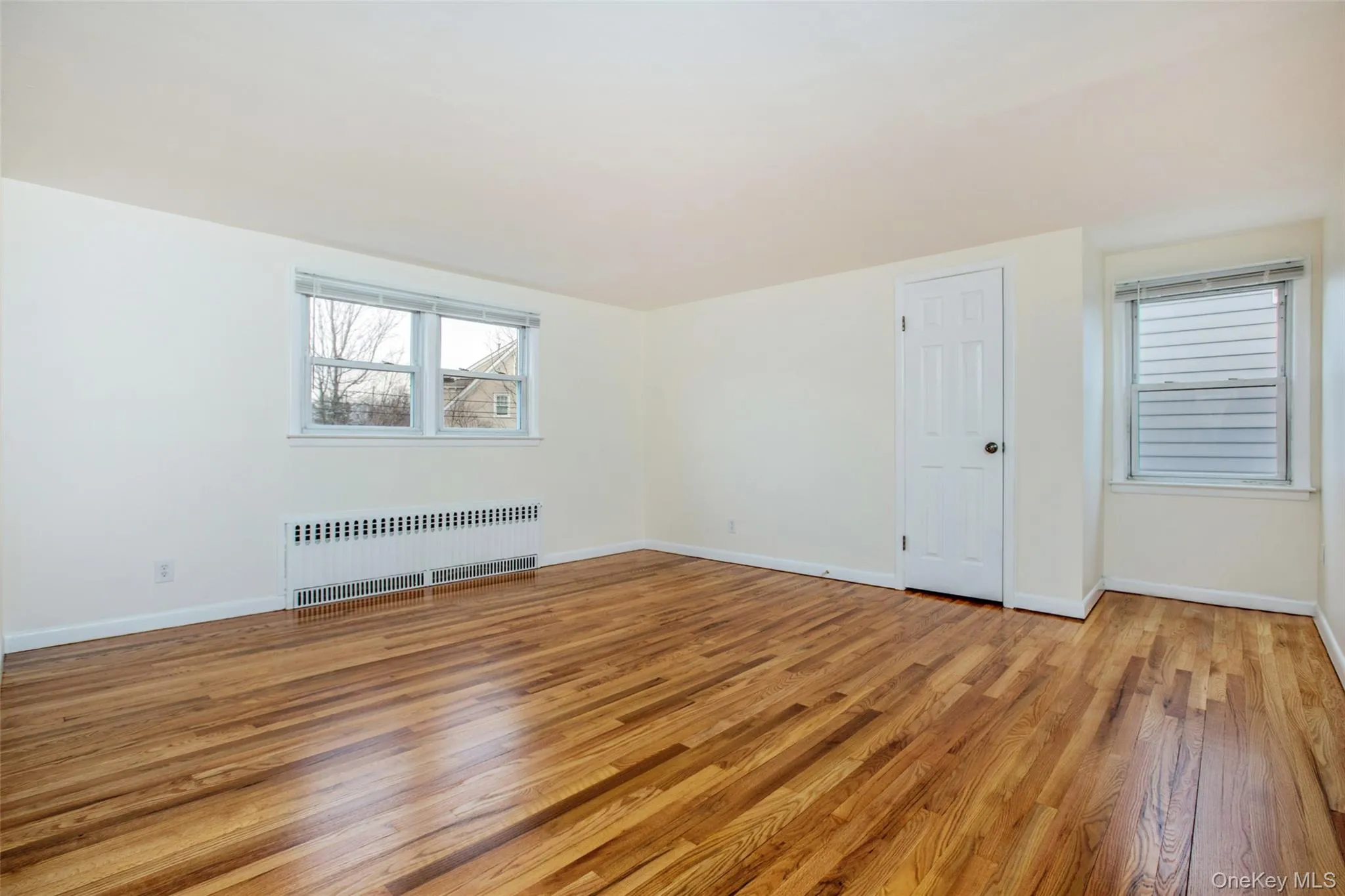 Beauty hardwood floors, window blinds already included. **There is now a wall Air conditioning unit located beneath the single window in this photo. It is not shown in this photo as photo was taken before it was installed. Beauty hardwood floors, window blinds already included. **There is now a wall Air conditioning unit located beneath the single window in this photo. It is not shown in this photo as photo was taken before it was installed.