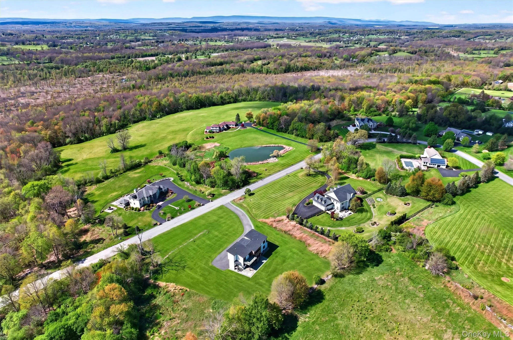 Beautiful street of upscale homes with panoramic views of the Hudson Valley Beautiful street of upscale homes with panoramic views of the Hudson Valley
