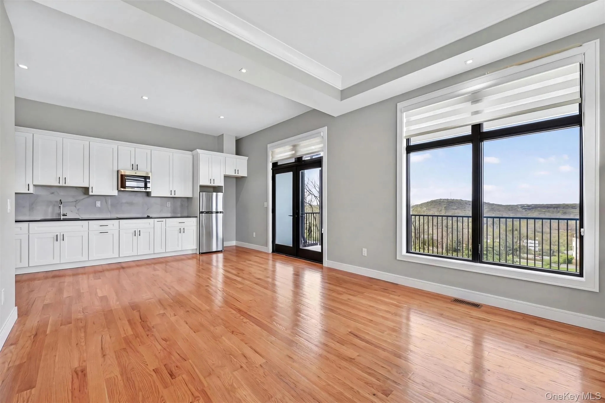 First floor in-law suite or accessory apartment living room and kitchen. First floor in-law suite or accessory apartment living room and kitchen.
