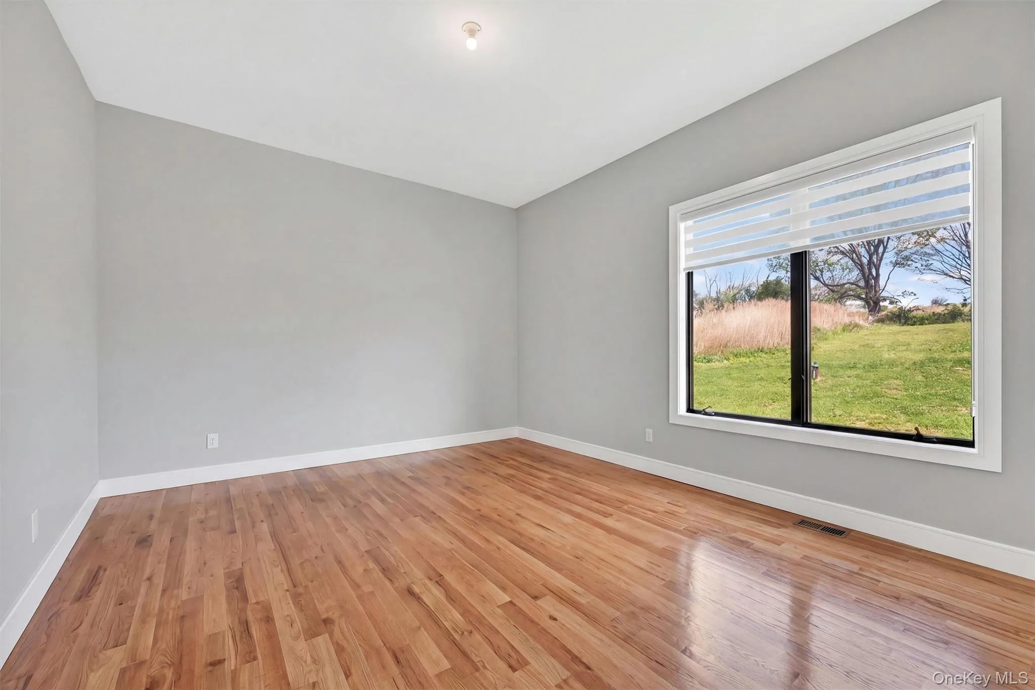 First floor in-law suite or accessory apartment bedroom with walk-in closet. First floor in-law suite or accessory apartment bedroom with walk-in closet.