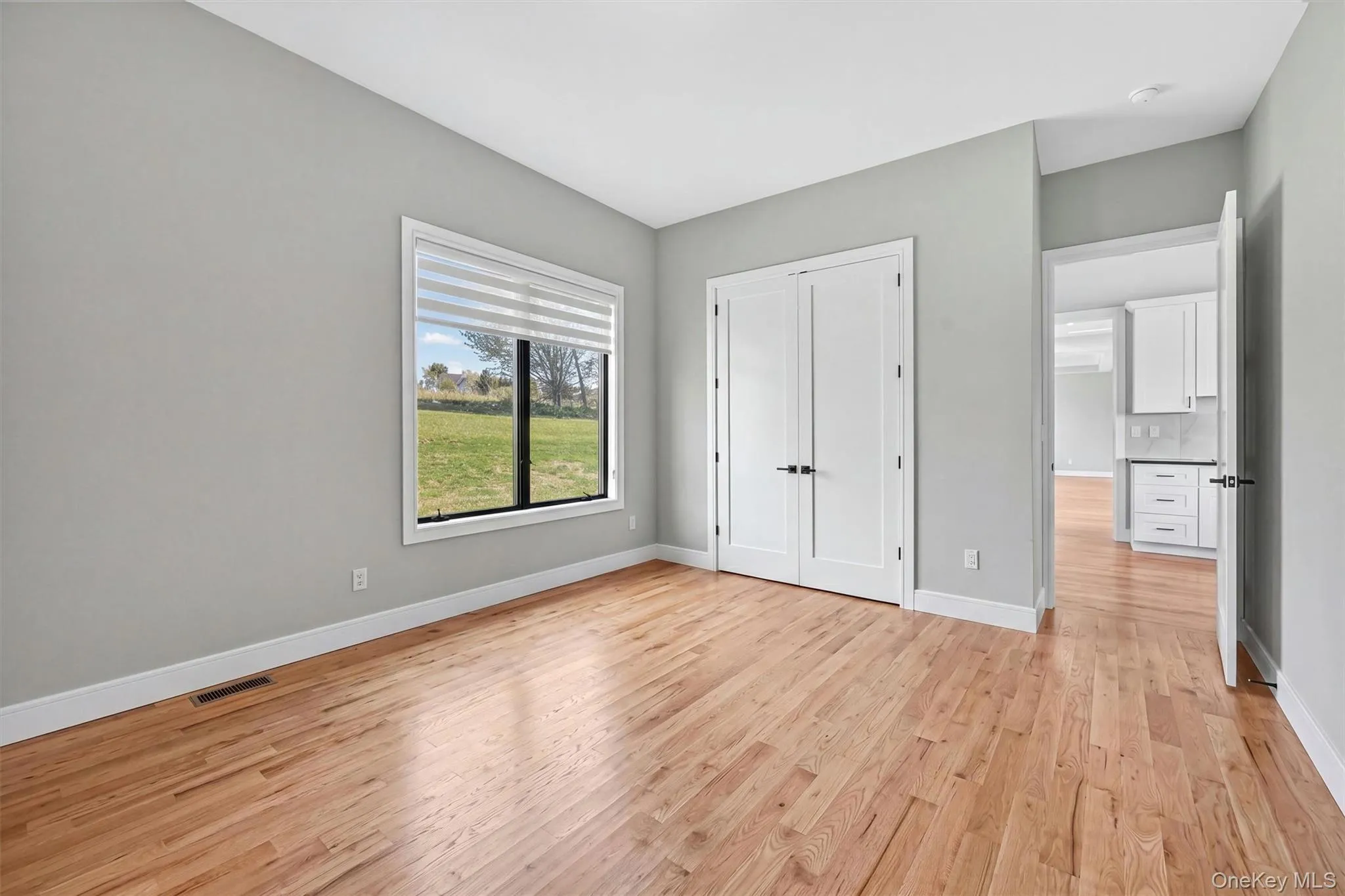 First floor in-law suite or accessory apartment bedroom with walk-in closet. First floor in-law suite or accessory apartment bedroom with walk-in closet.