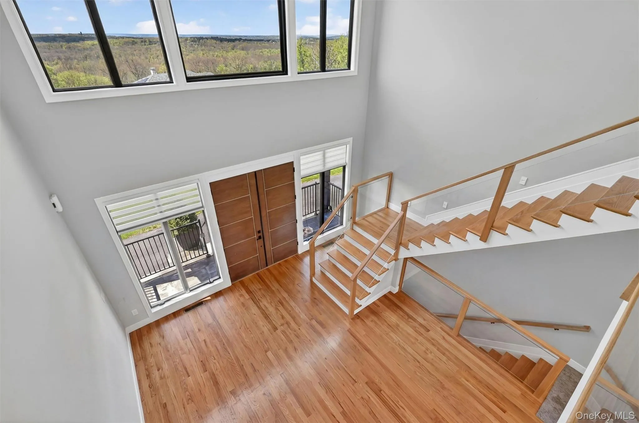 Double height entry foyer with panoramic views. Double height entry foyer with panoramic views.