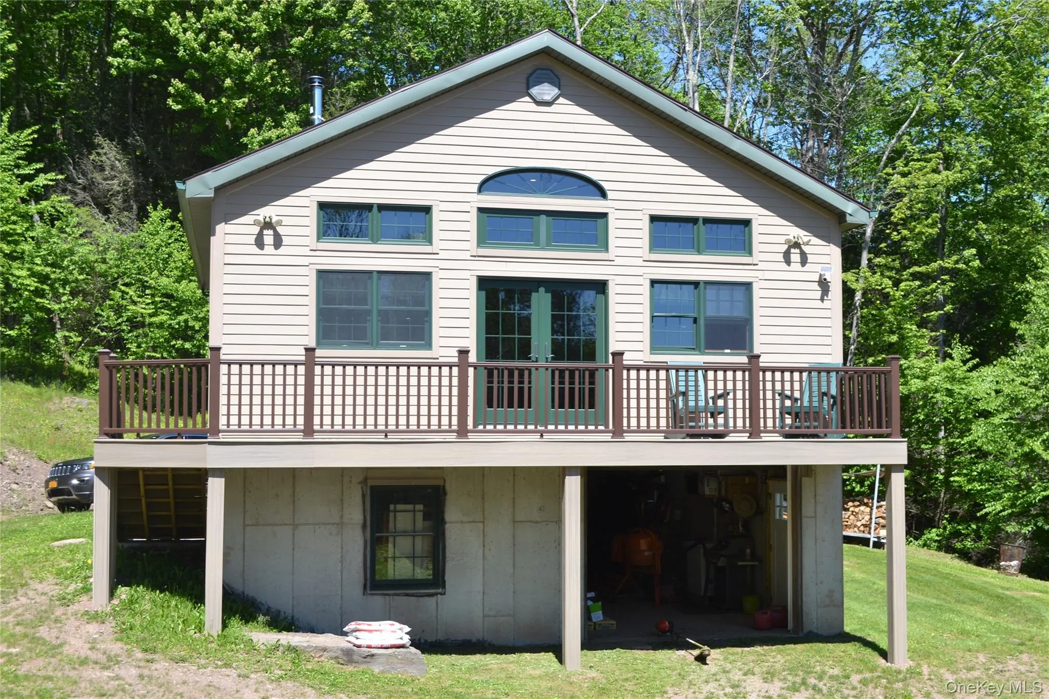 Front of house showing lower garage Front of house showing lower garage