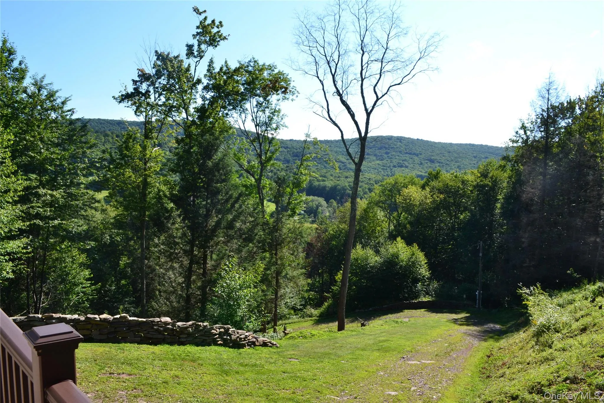 View of driveway, stone walls and long range views View of driveway, stone walls and long range views
