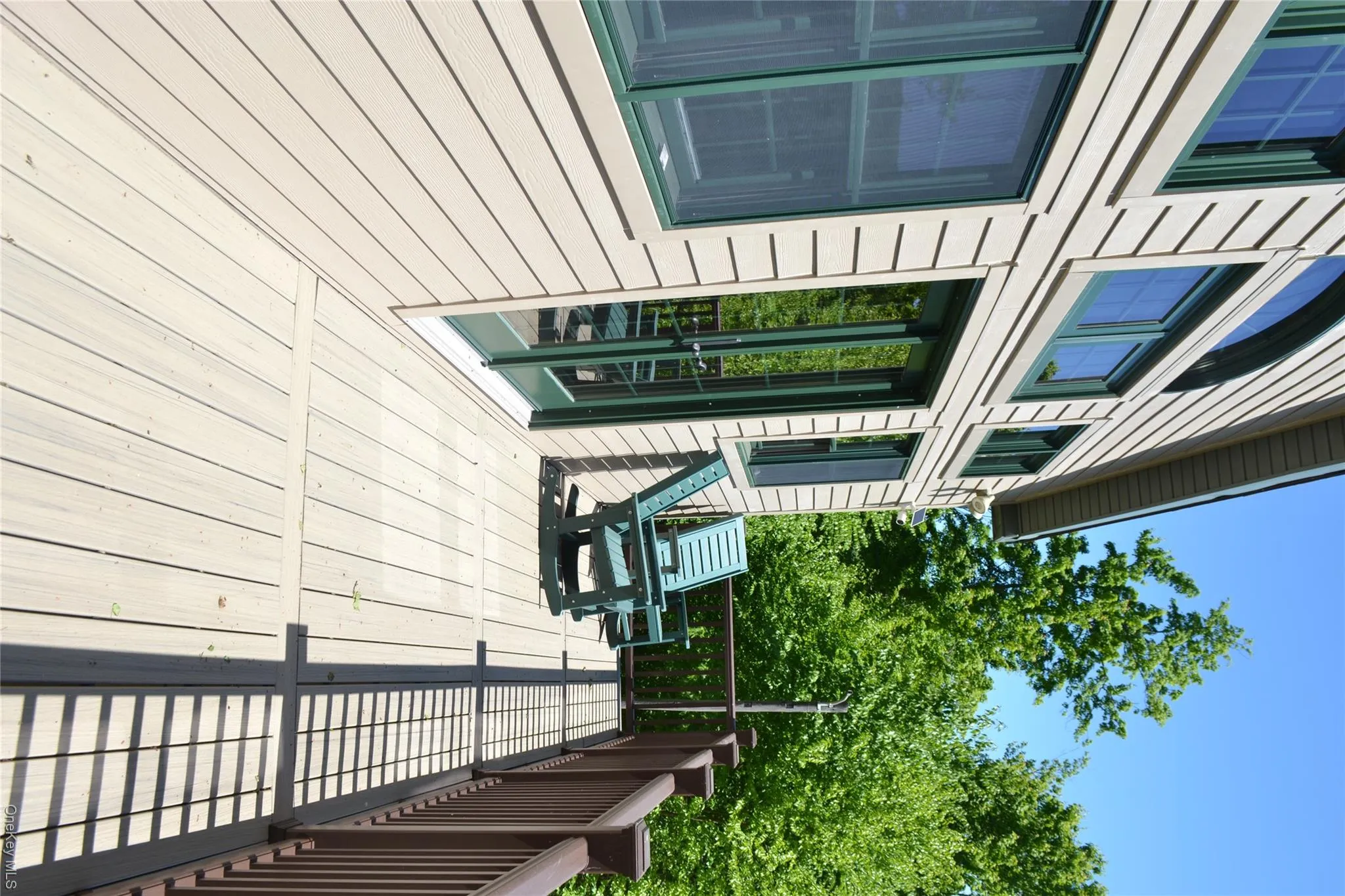 Sliders from living room to exterior deck Sliders from living room to exterior deck