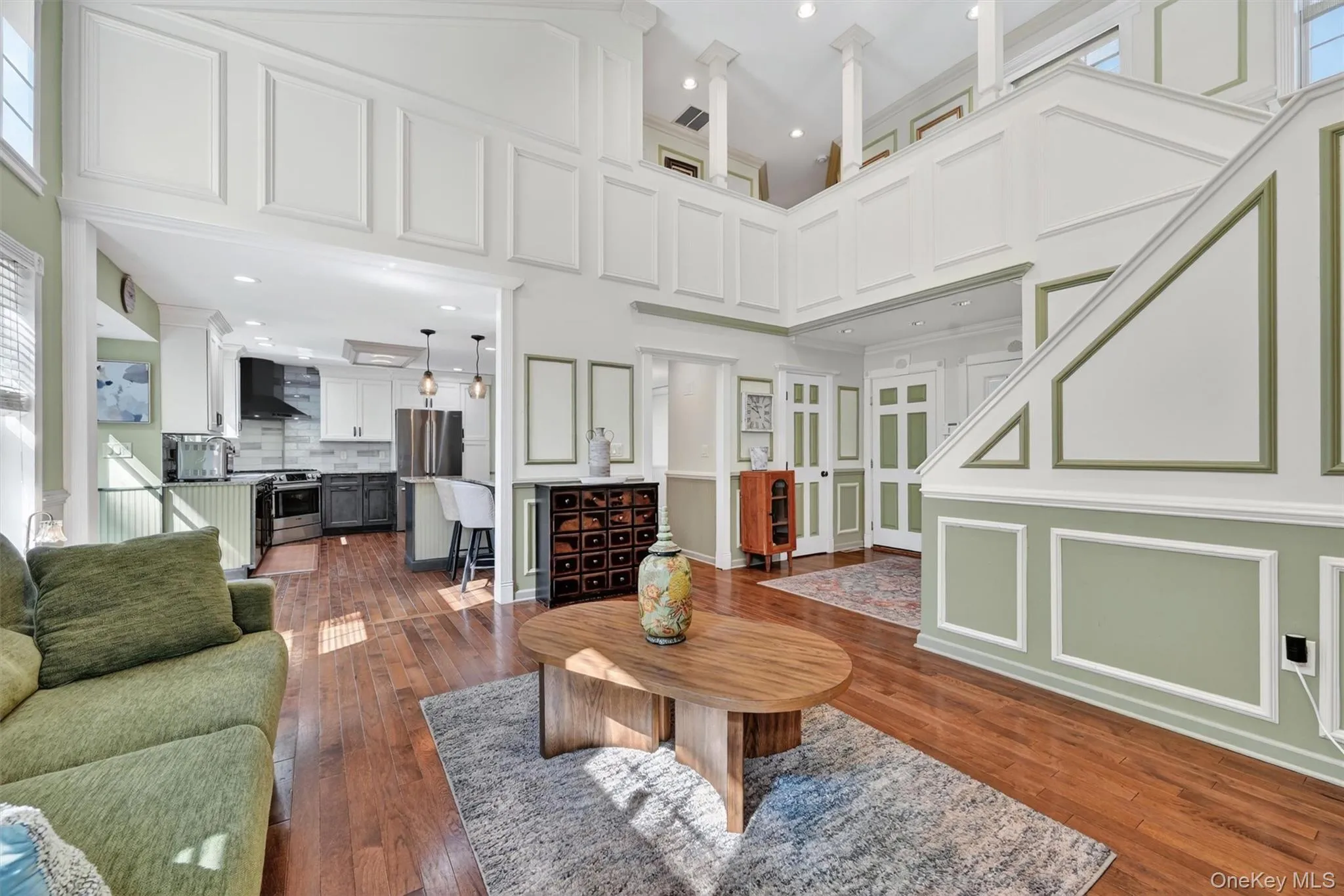 Notice the detailed molding and two story ceiling. Notice the detailed molding and two story ceiling.