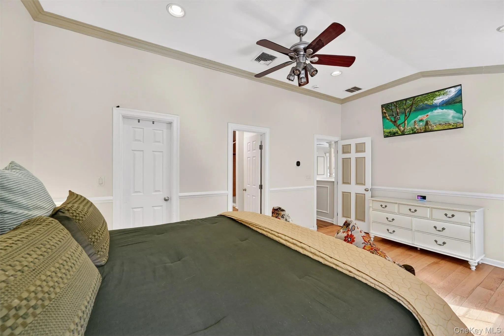 The doors to the left are the walk in closet and primary bath. The doors to the left are the walk in closet and primary bath.
