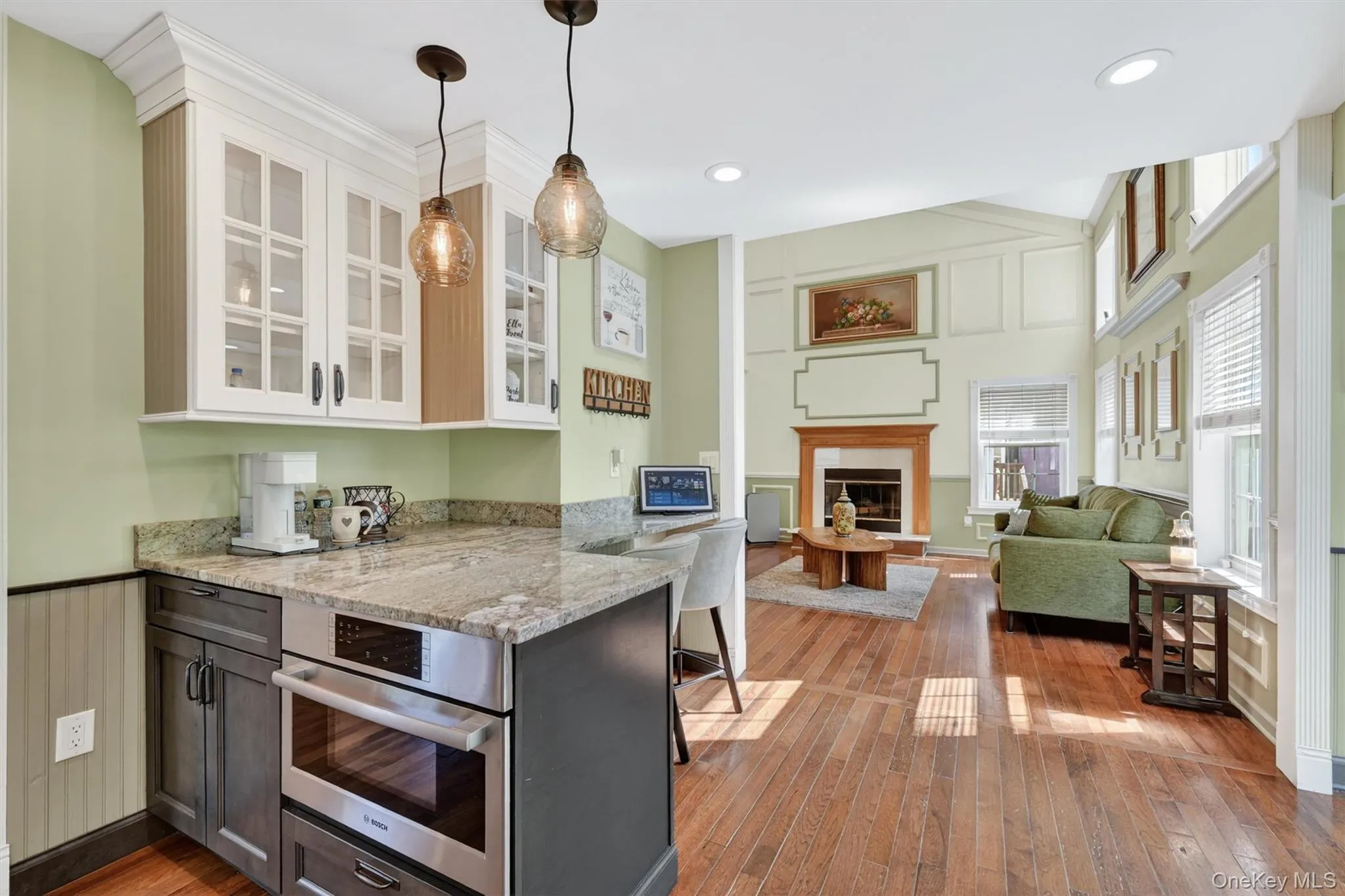 The kitchen is the heart of this home with it's designer lighting and showcase cabinets. The kitchen is the heart of this home with it's designer lighting and showcase cabinets.