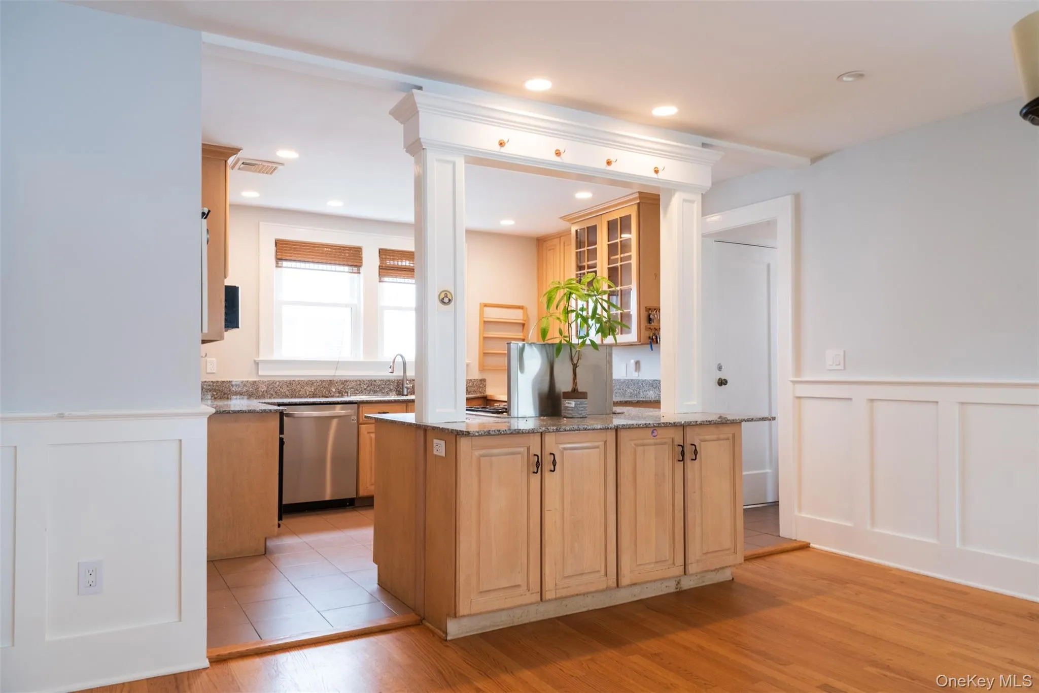 Kitchen open to dining room. Kitchen open to dining room.