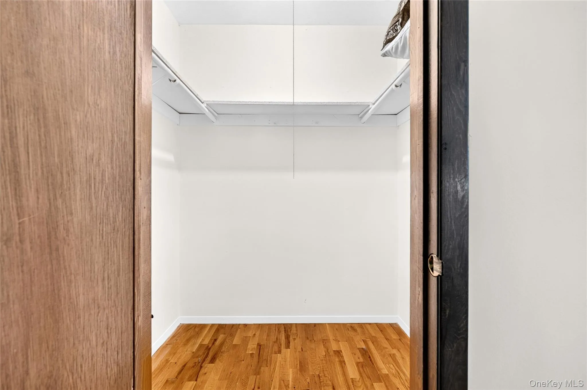 Walk in closet in Primary bedroom Walk in closet in Primary bedroom