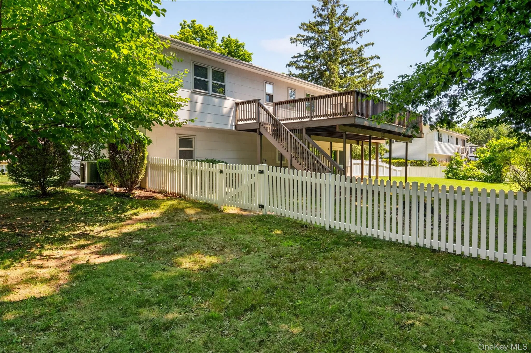 Level partially fenced in backyard Level partially fenced in backyard