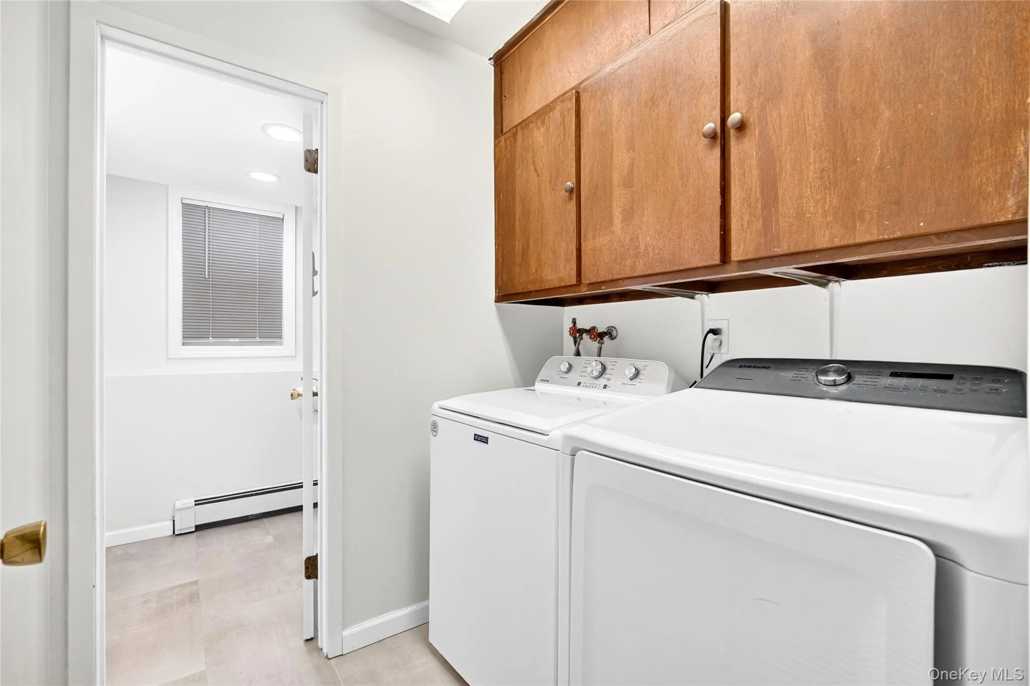 Laundry area located in bathroom #3 on lower level Laundry area located in bathroom #3 on lower level