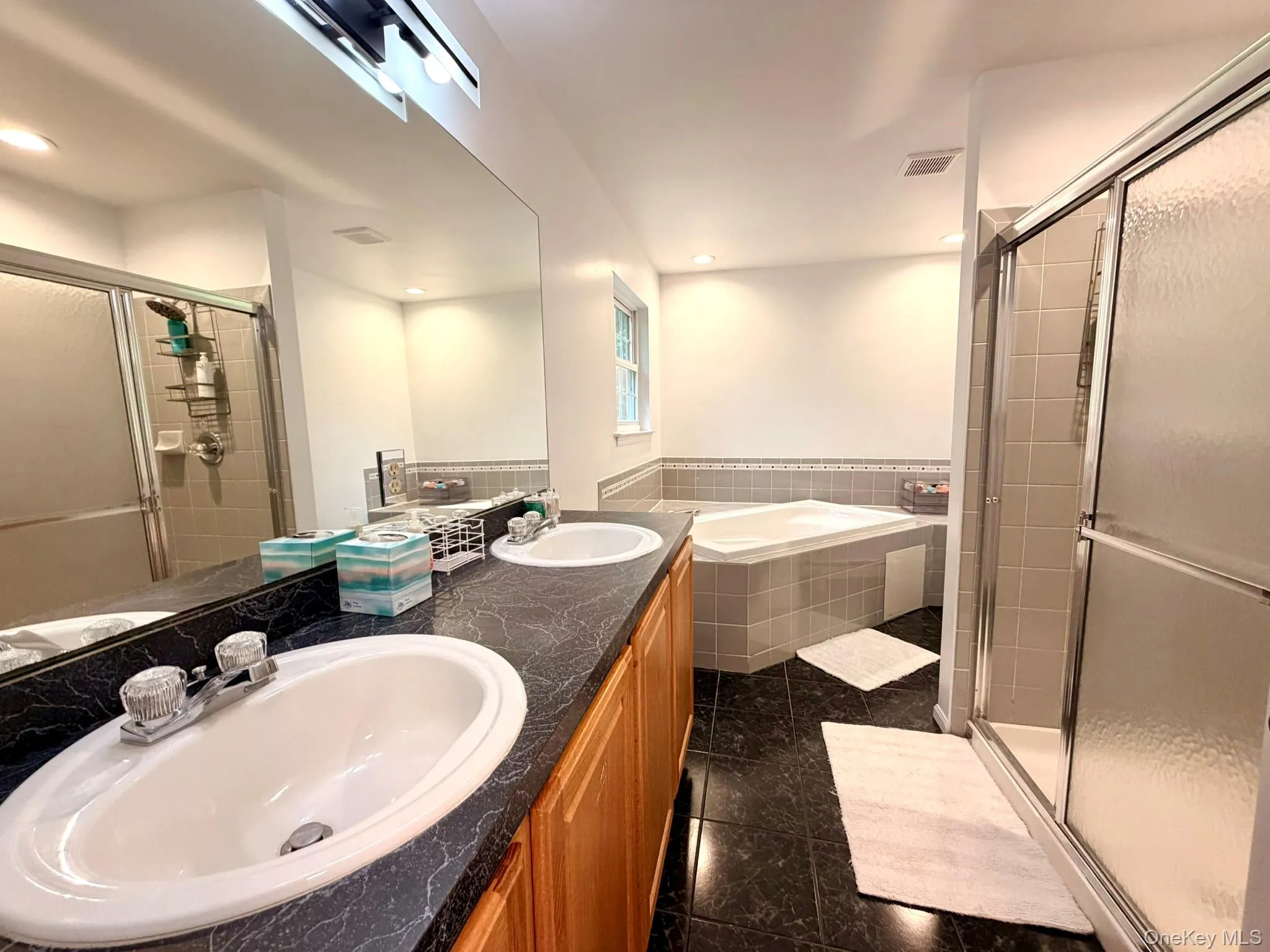 Primary Bathroom with Double Vanity Shower & Soaker Tub Primary Bathroom with Double Vanity Shower & Soaker Tub