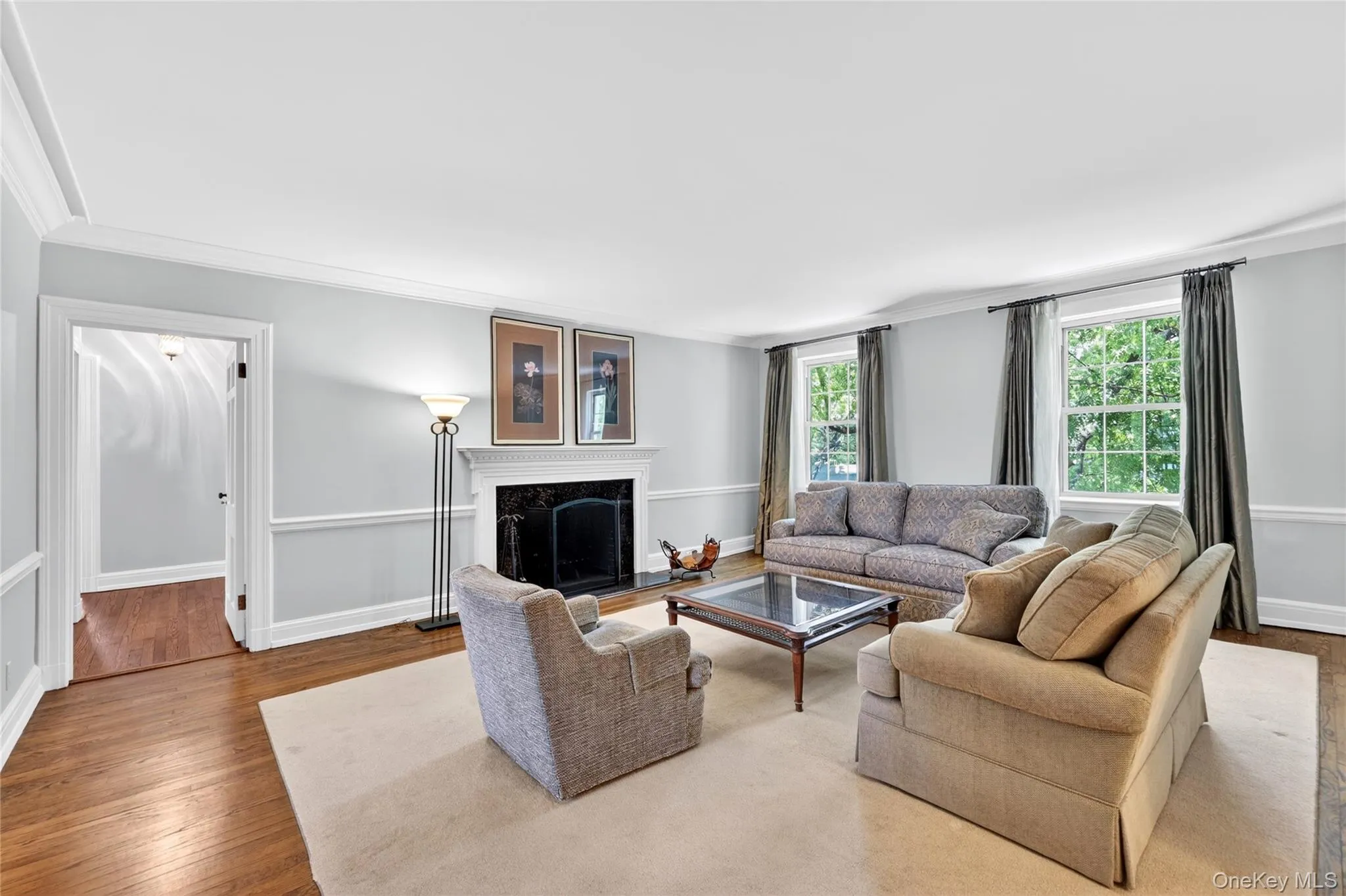The Living Room offers generous space with a wood burning fireplace The Living Room offers generous space with a wood burning fireplace