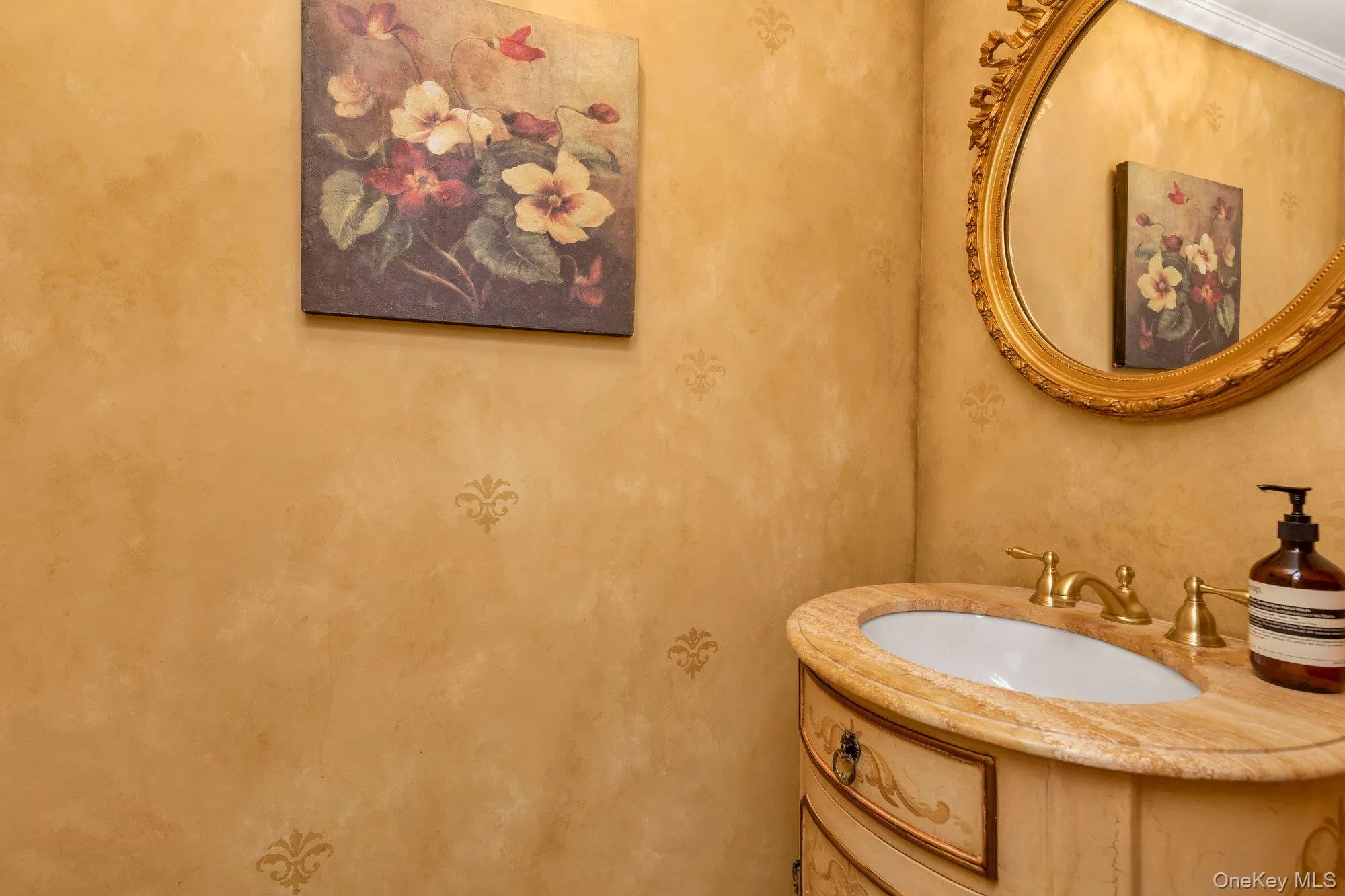 Curved vanity with an undermount sink and stone countertop Curved vanity with an undermount sink and stone countertop