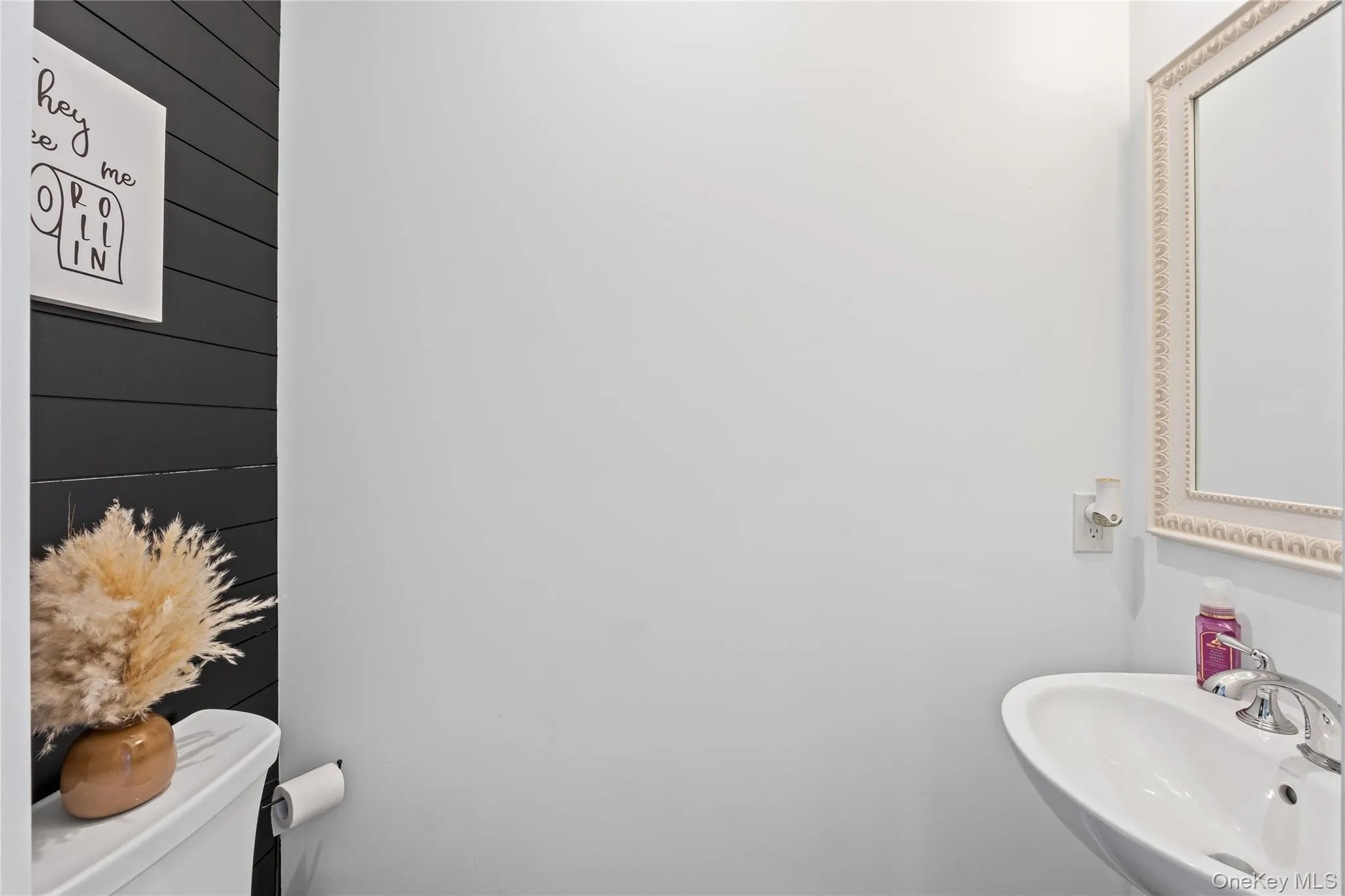 Bathroom with a sink and toilet Bathroom with a sink and toilet