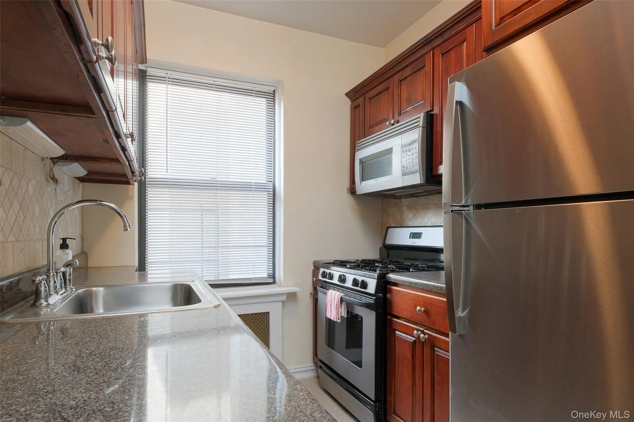 APT. 51 - View of 9'-3" x 17'-0" windowed Eat-In Kitchen facing north. APT. 51 - View of 9'-3" x 17'-0" windowed Eat-In Kitchen facing north.