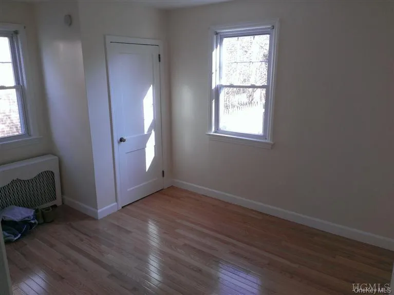This is the second of two spacious bedrooms on ground floor, both with new (2013) hardwood flooring. This is the second of two spacious bedrooms on ground floor, both with new (2013) hardwood flooring.