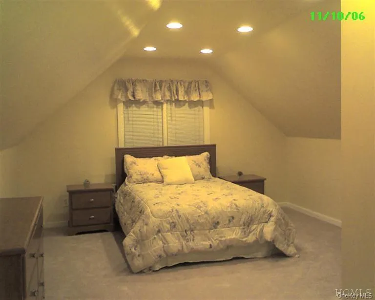 Serene master bedroom with brand new wall-to-wall carpeting is part of the private master suite which occupies the entire second floor. Lighting has been upgraded with energy-efficient recessed LED retrofit kits. Serene master bedroom with brand new wall-to-wall carpeting is part of the private master suite which occupies the entire second floor. Lighting has been upgraded with energy-efficient recessed LED retrofit kits.
