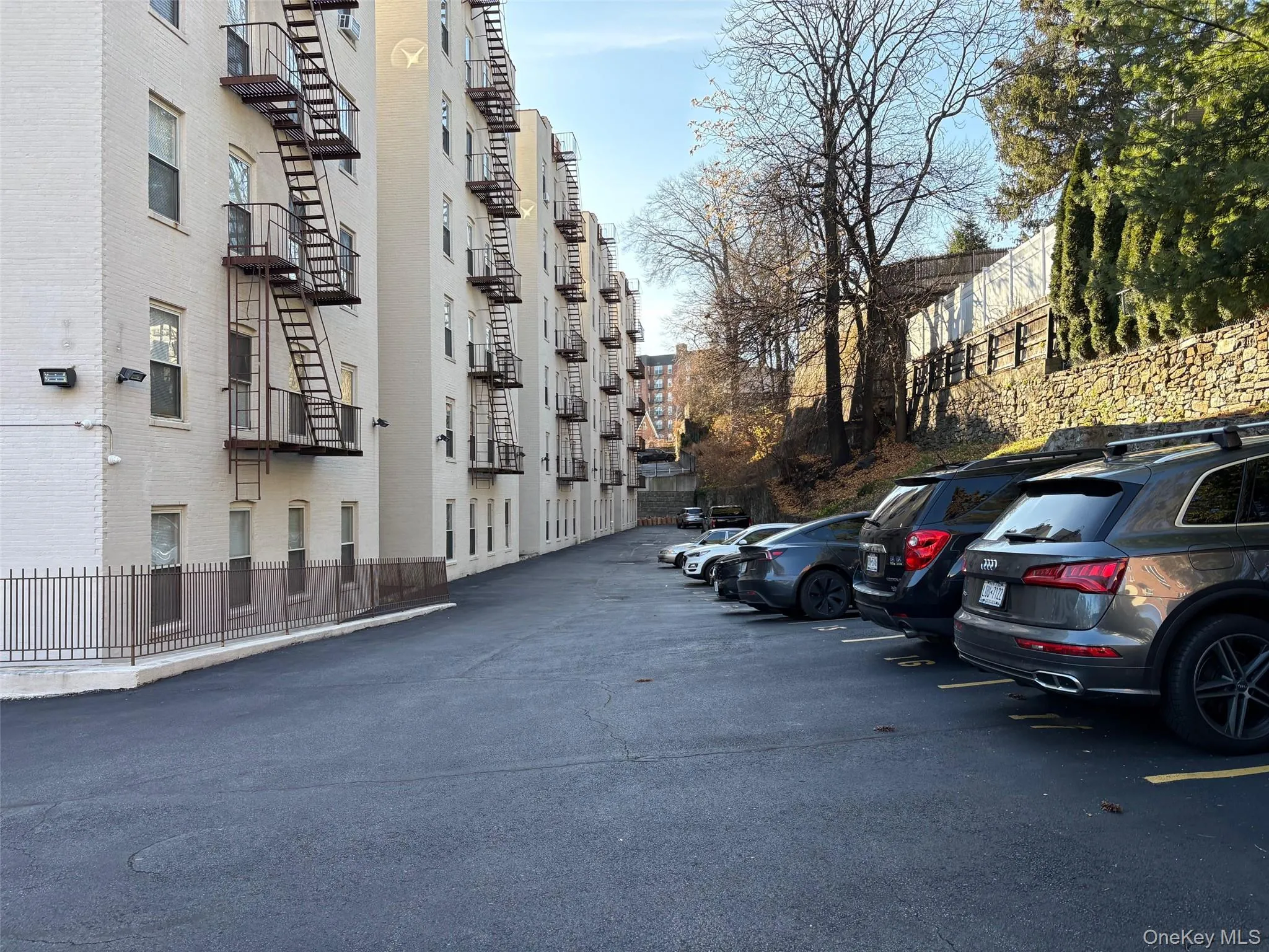 Parking lot behind and on the side of the building Parking lot behind and on the side of the building