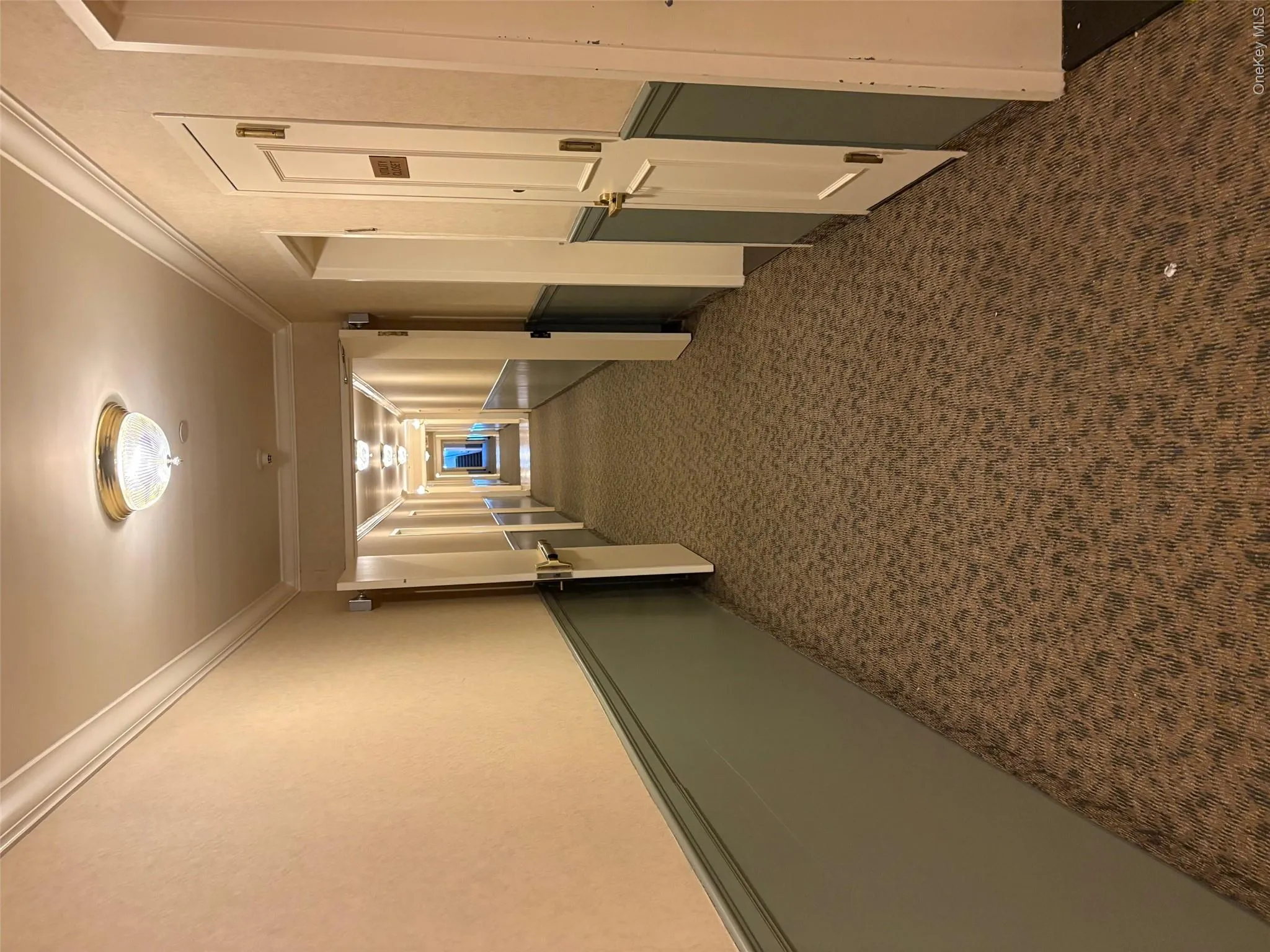Hallway leading to apartments Hallway leading to apartments
