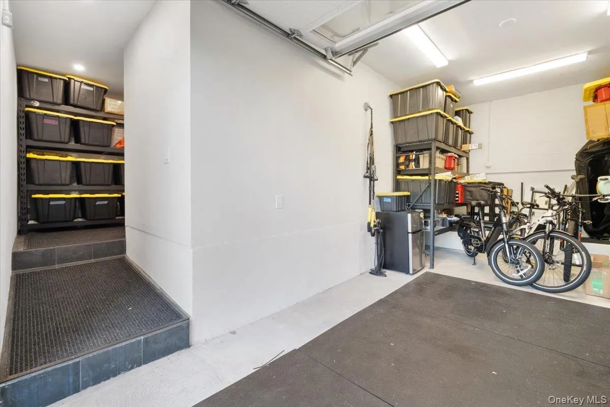 One car garage with ample storage, with walk-in access to basement. One car garage with ample storage, with walk-in access to basement.
