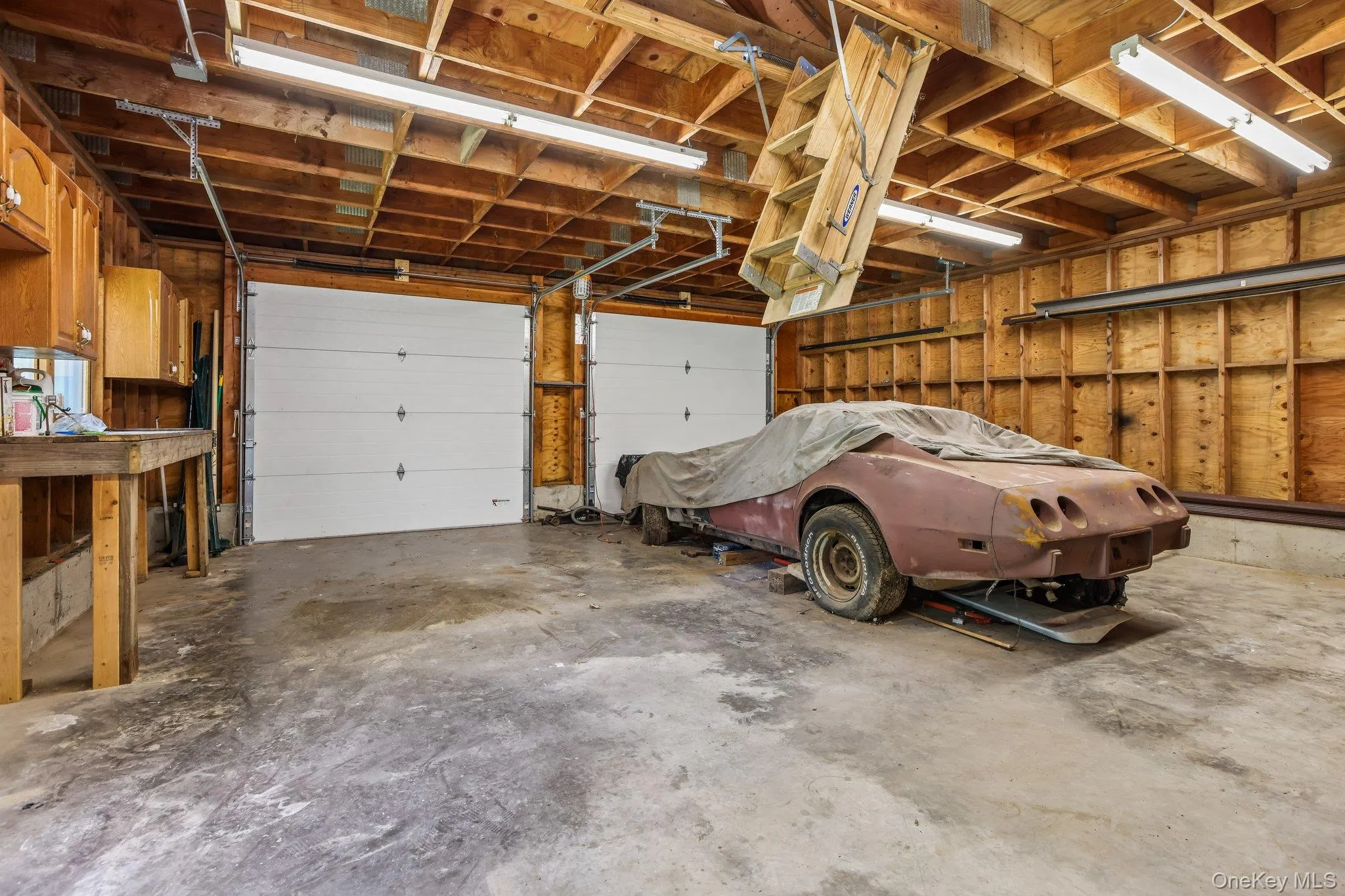 Garage with attic and pull down stairs Garage with attic and pull down stairs