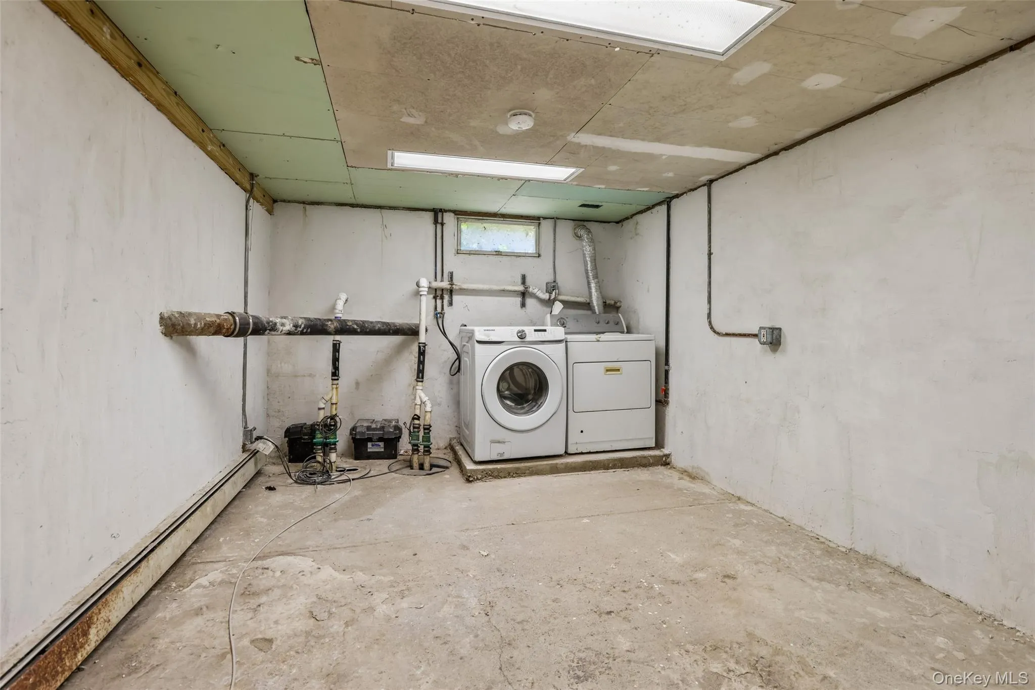 Basement with washer and dryer Basement with washer and dryer