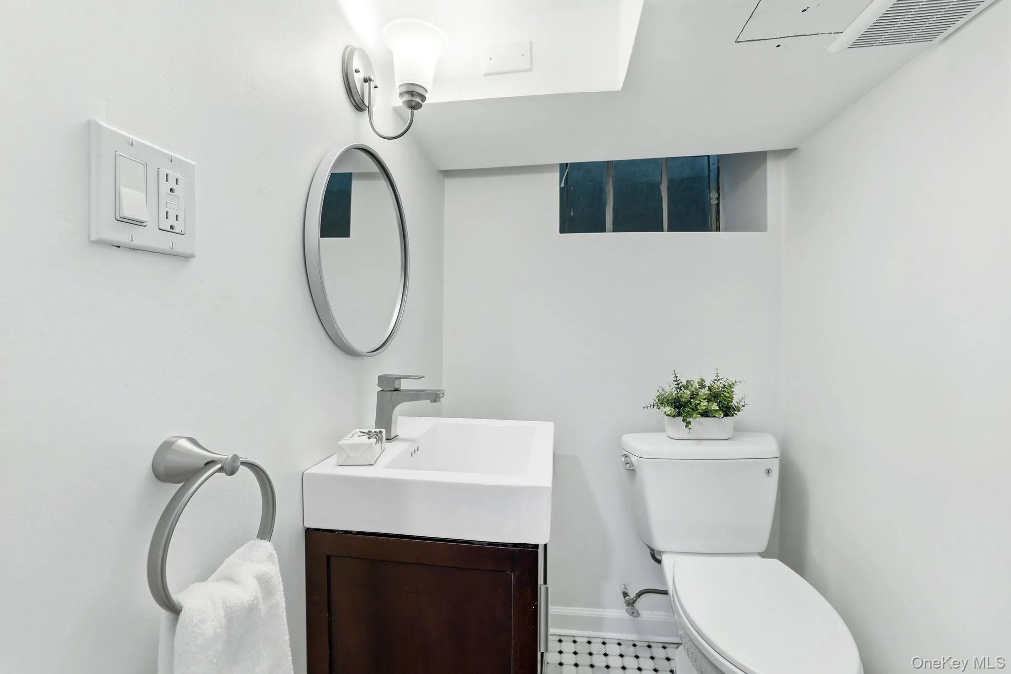Lower Level Powder Room Lower Level Powder Room