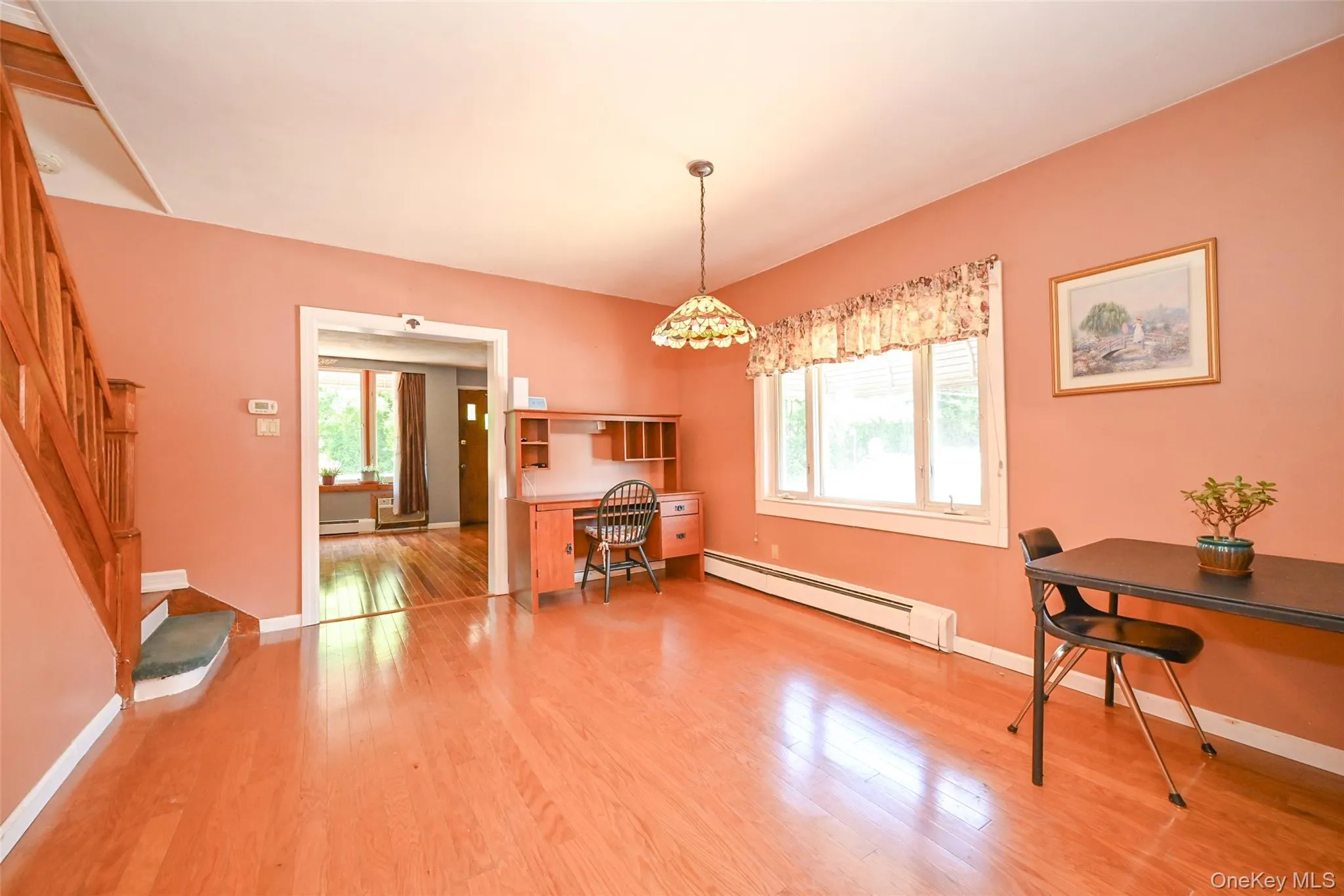 Dining room featuring pre-engineered hardwood. Dining room featuring pre-engineered hardwood.