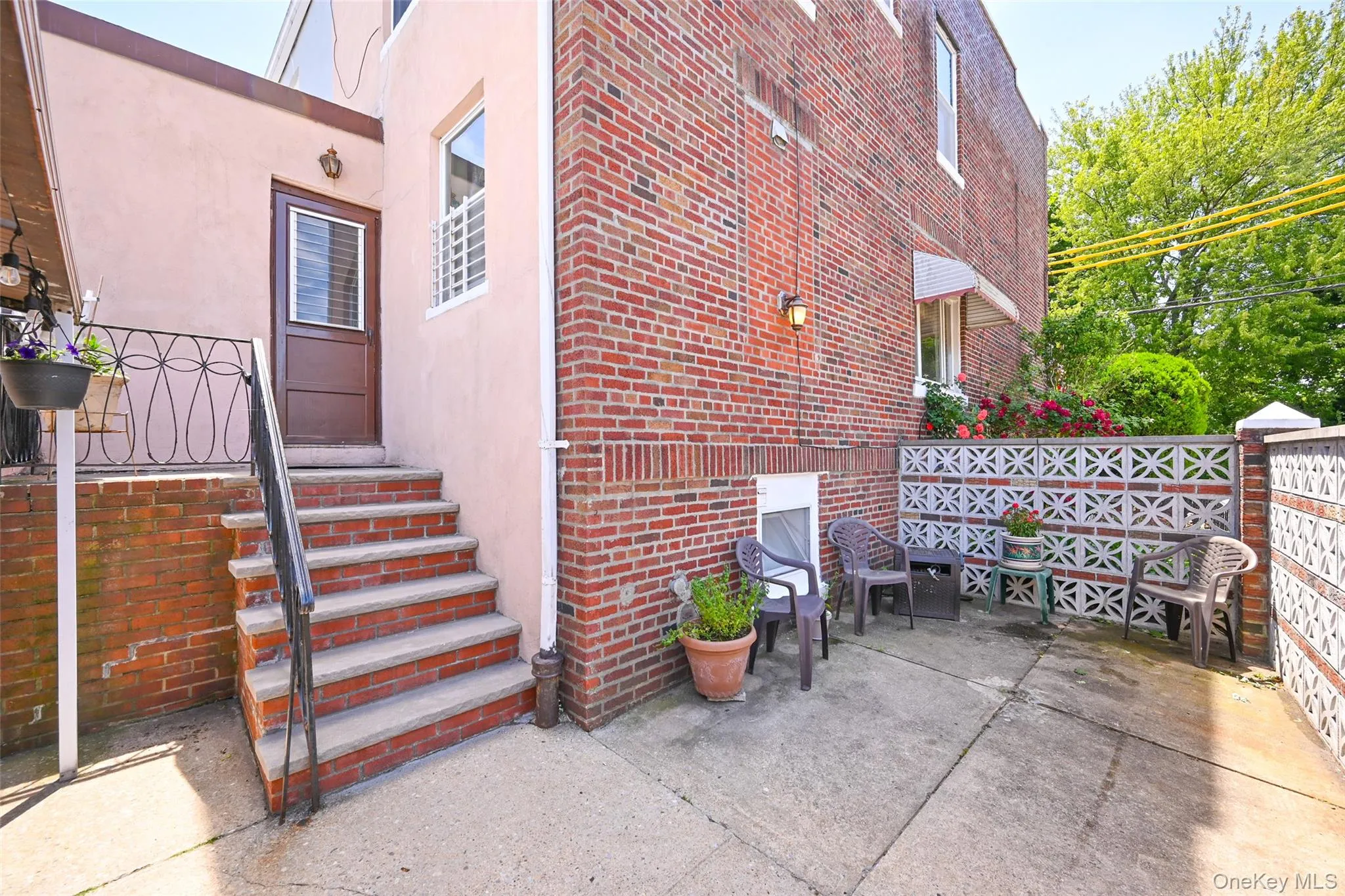 Back entrance and patio. Back entrance and patio.