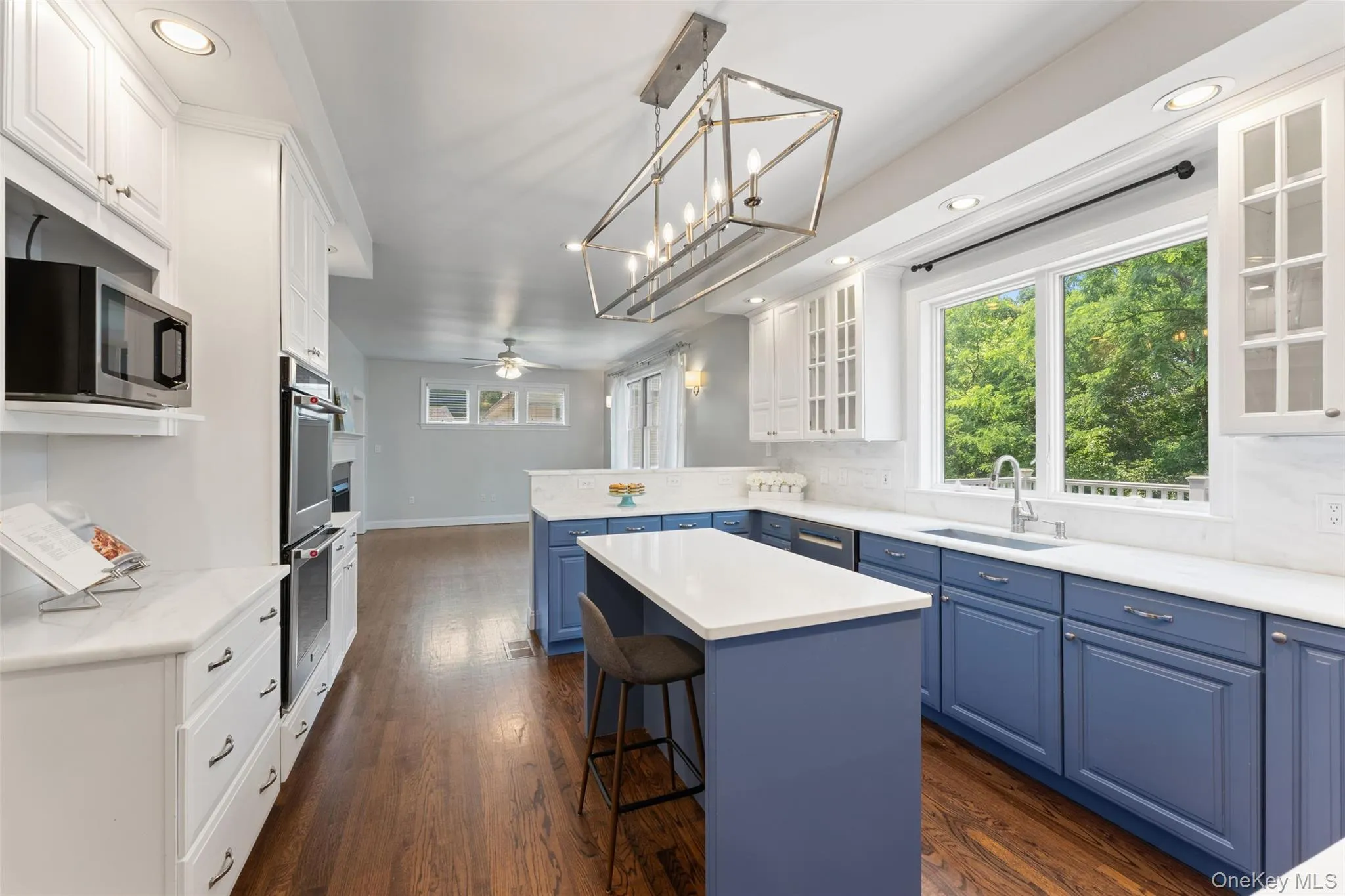 Updated chef's kitchen with marble countertops and new appliances Updated chef's kitchen with marble countertops and new appliances