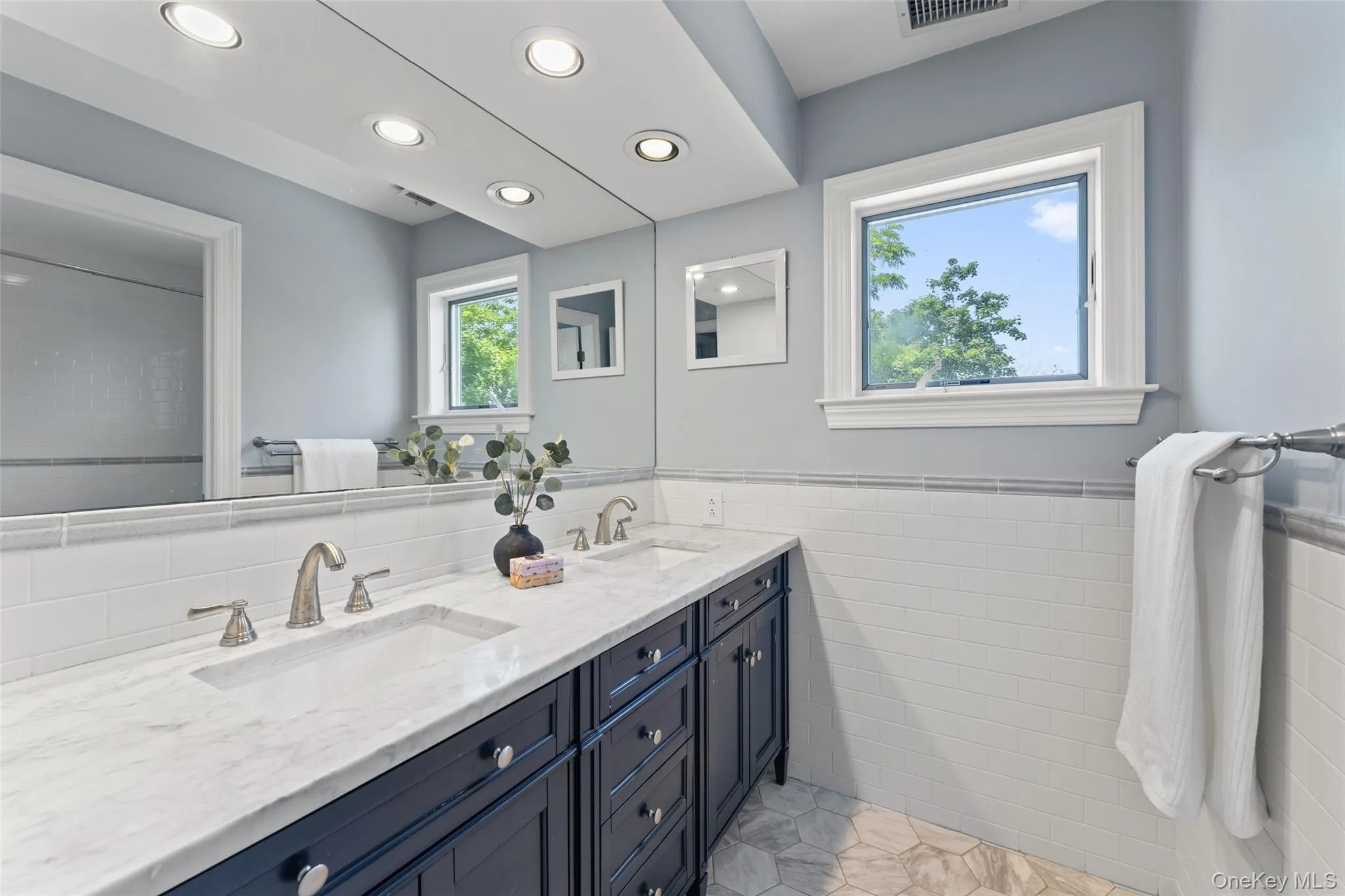 Updated hall bath for bedrooms on second floor with bathtub Updated hall bath for bedrooms on second floor with bathtub