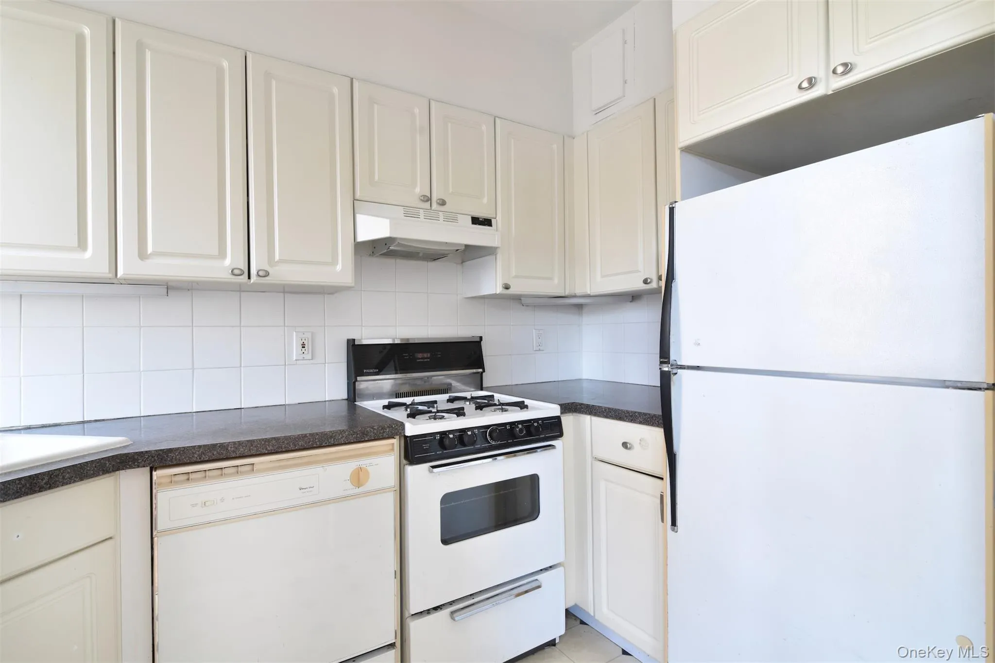The kitchen is equipped with a dishwasher for added convenience. The kitchen is equipped with a dishwasher for added convenience.