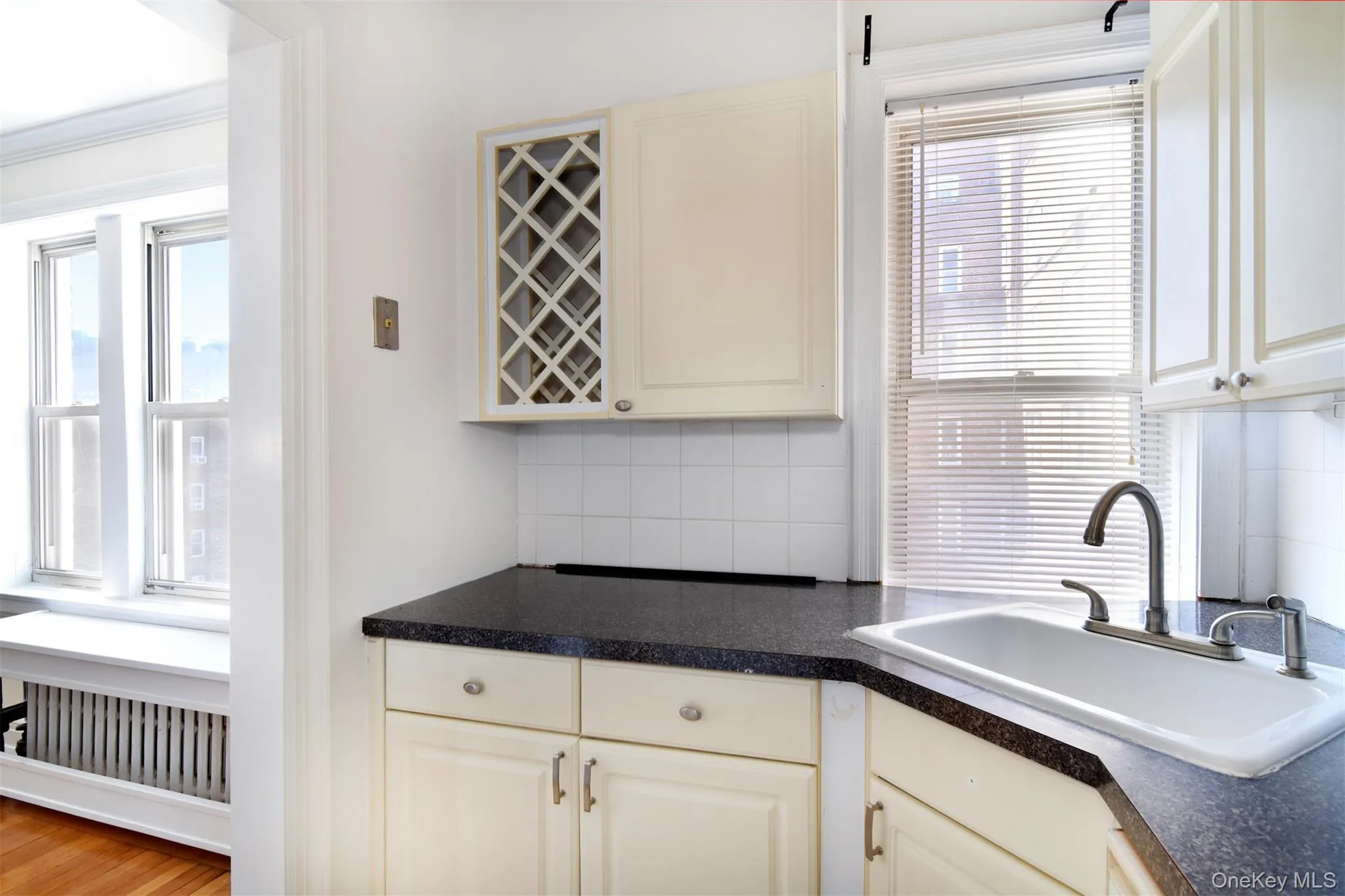 A custom built wine rack adds a nice touch to the space! A custom built wine rack adds a nice touch to the space!