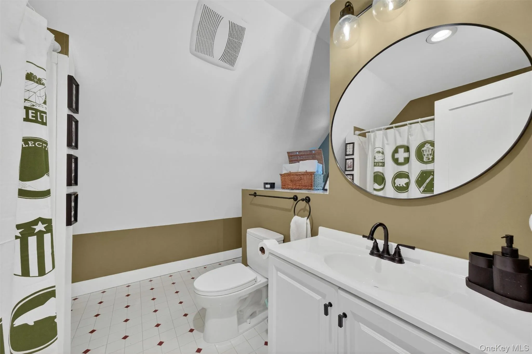 A chic Hall Bath serves the secondary bedroom & guests. A chic Hall Bath serves the secondary bedroom & guests.