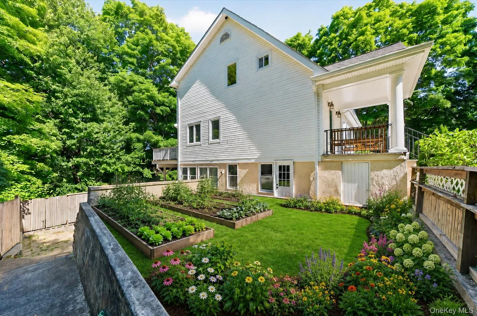 A lovely Garden area (virtually staged w/flower & vegetable gardens). A lovely Garden area (virtually staged w/flower & vegetable gardens).