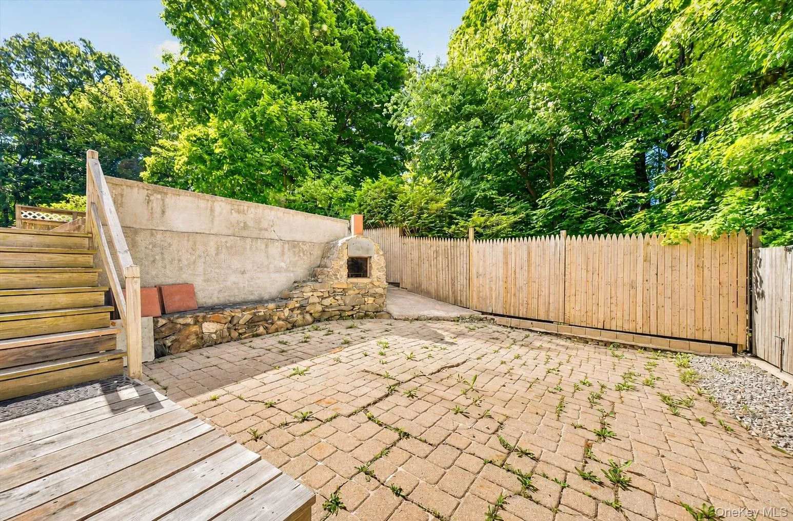 The rustic stone oven creates the perfect setting for al fresco dining. The rustic stone oven creates the perfect setting for al fresco dining.