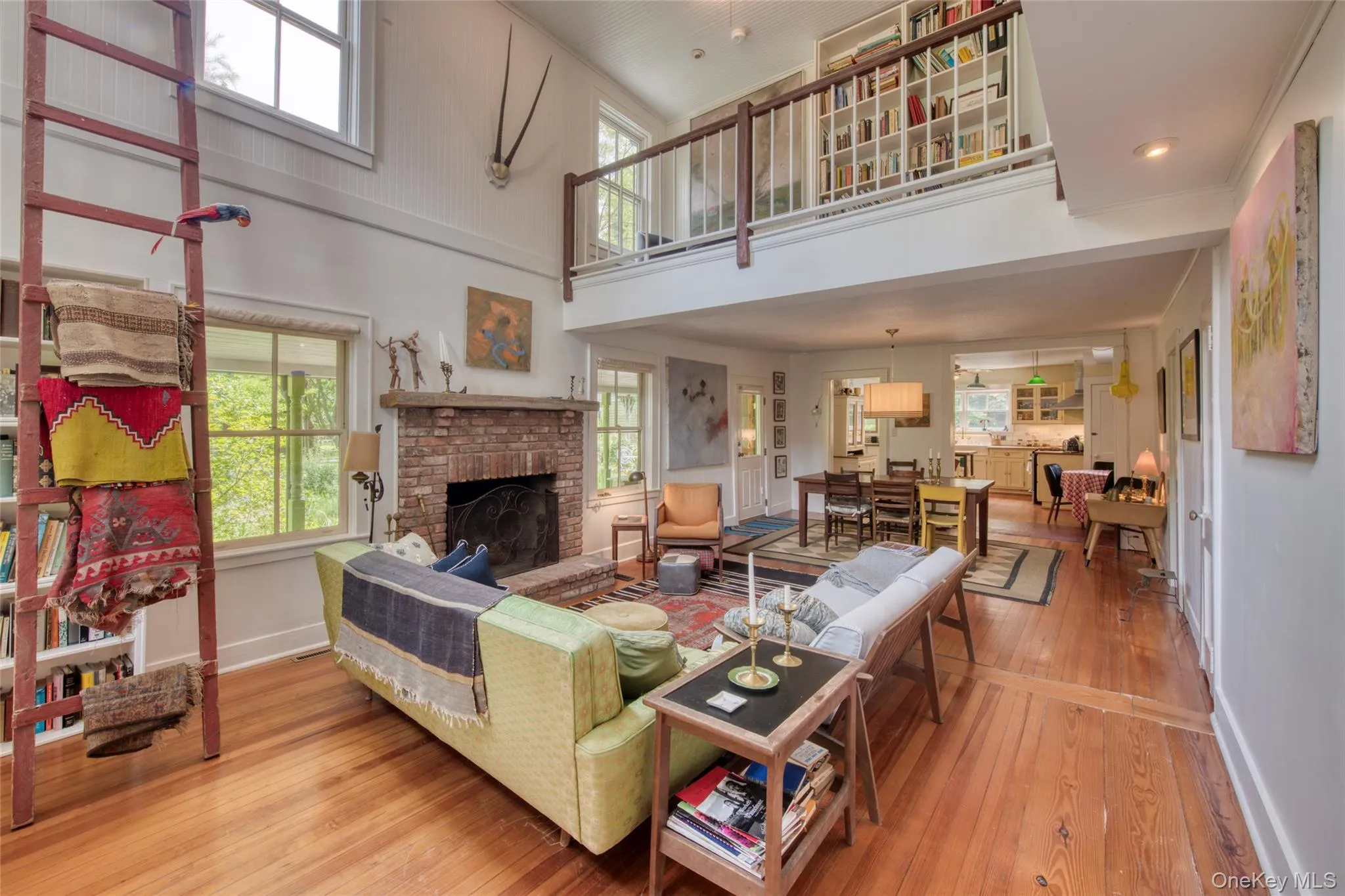 living/ dining/ kitchen with cathedral ceiling and 2nd floor balcony living/ dining/ kitchen with cathedral ceiling and 2nd floor balcony