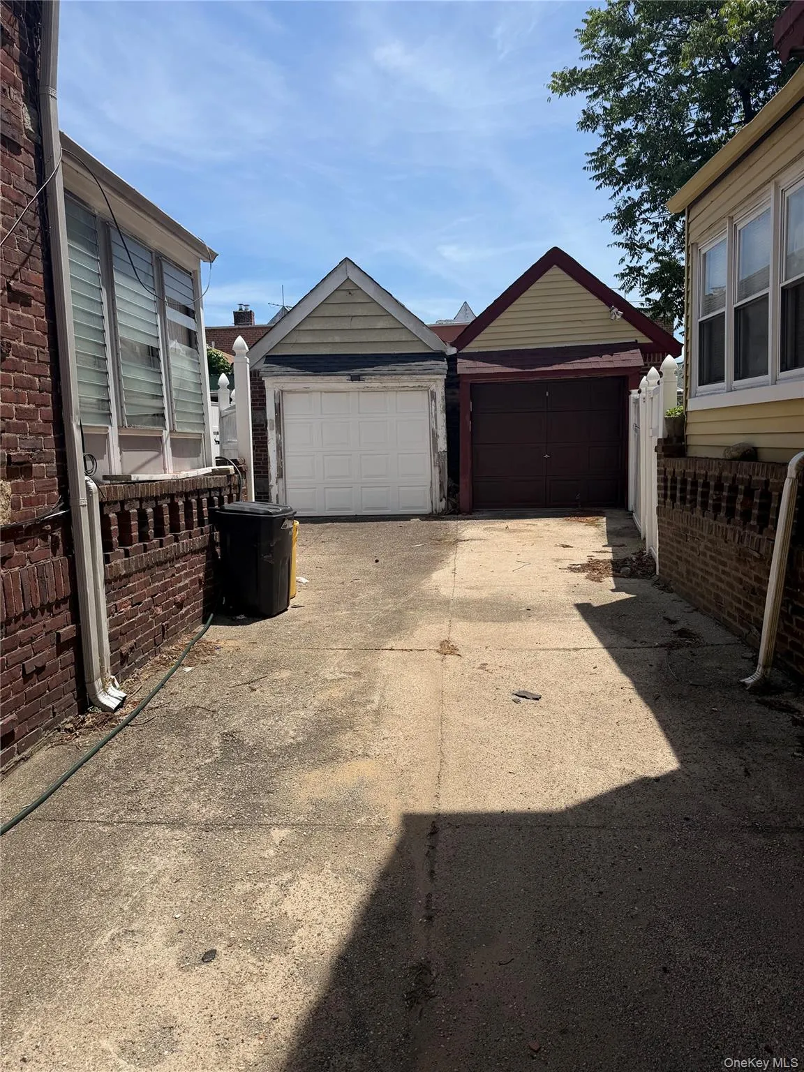 Paved driveway leading to the properties detached garage. Paved driveway leading to the properties detached garage.